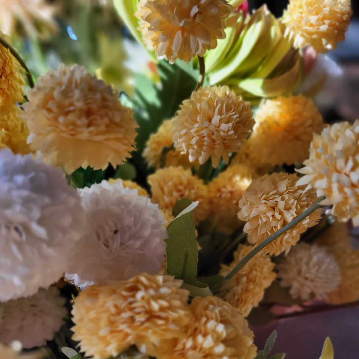 Lifelike small artificial bubble dahlia stems in yellow and white for vases and floral displays
