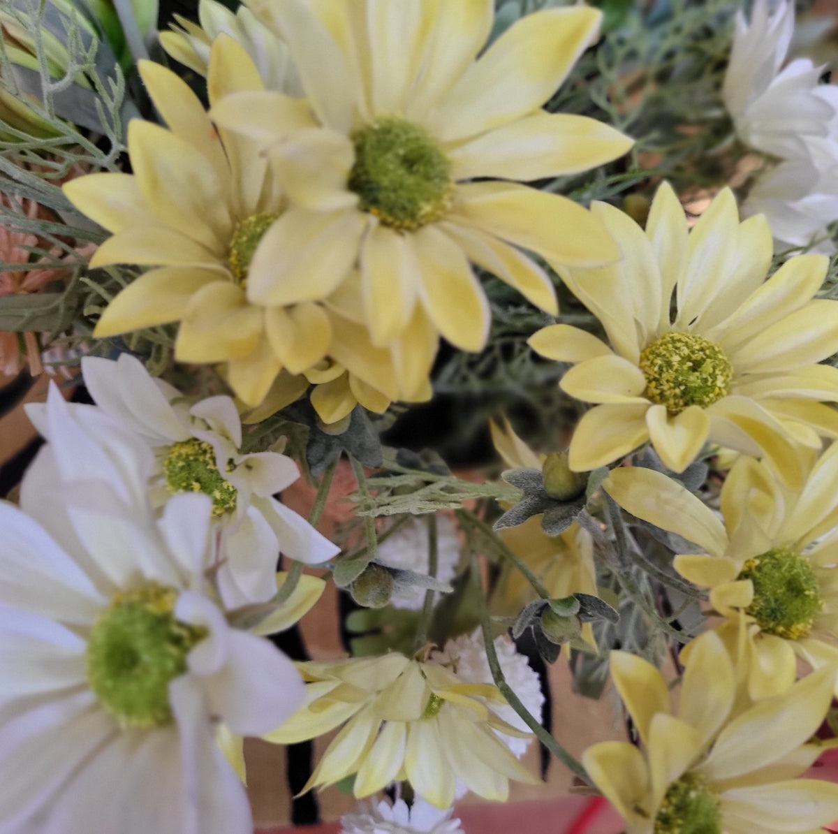 Lifelike artificial marguerite daisy in yellow, white, pink and blue for vases and floral displays