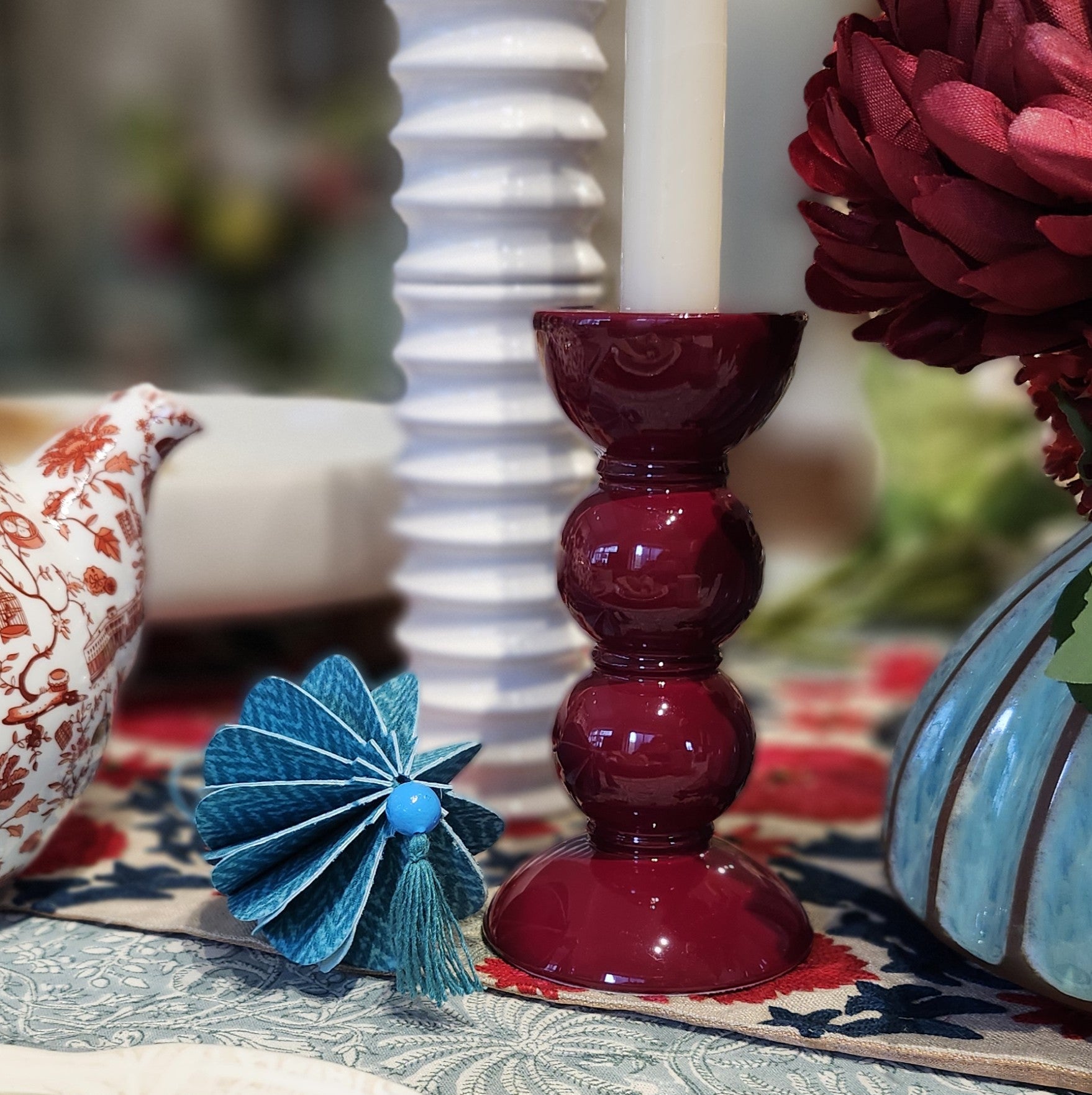 Bobbin Candlestick Cherry, candlestick holder at Inside Living Singapore. Side view.