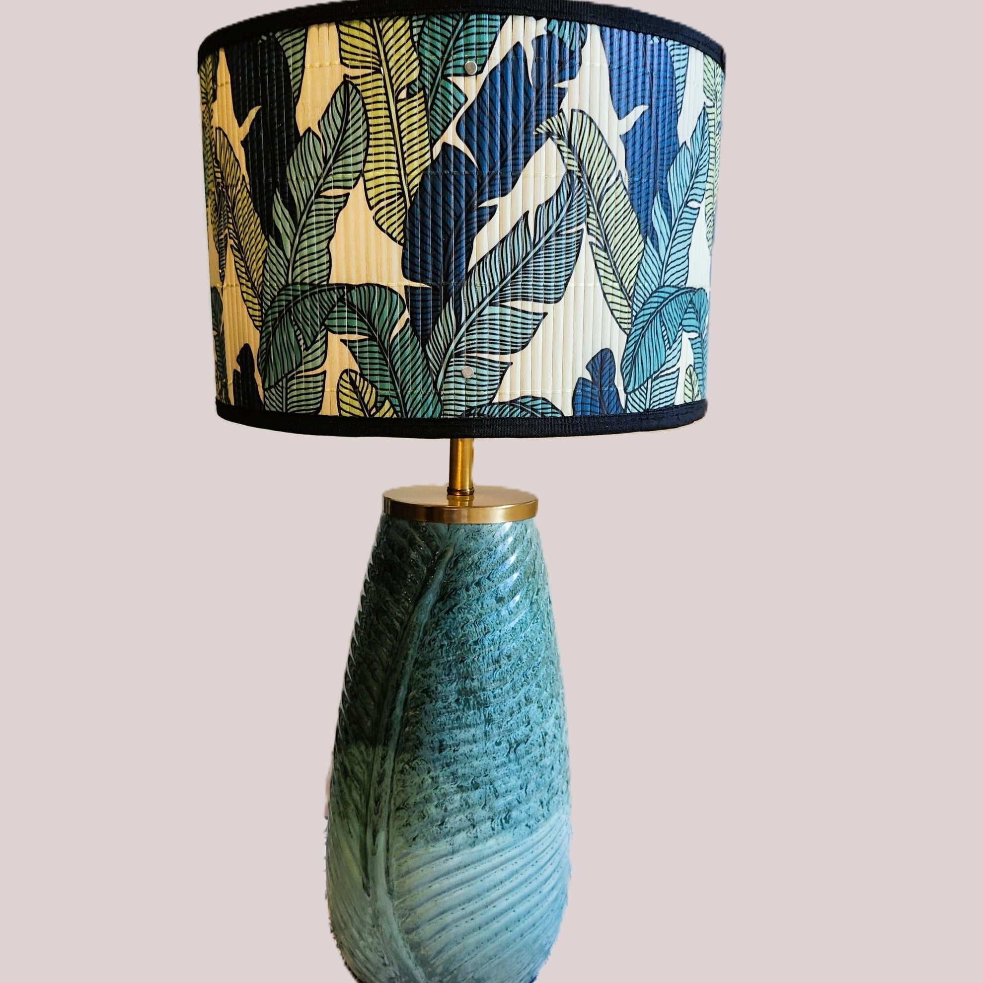 Annam Lamp Leaf Green with Bamboo Shade, decorative table lamp at Inside Living Singapore. Side view.