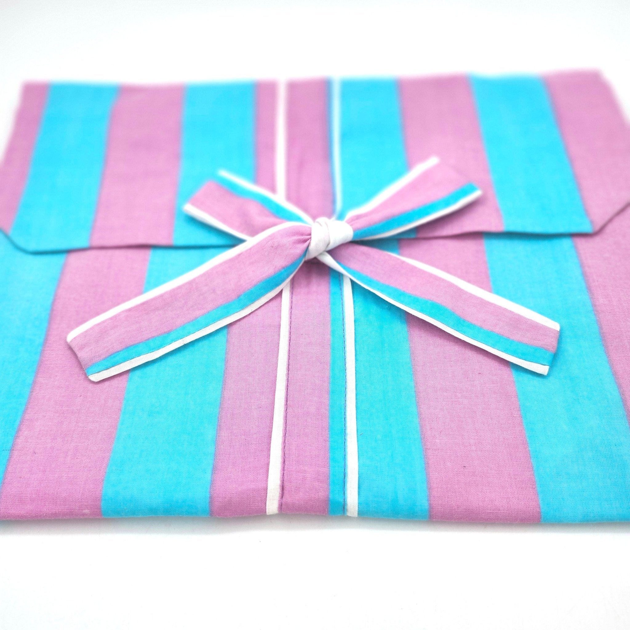 Block printed cotton pyjama shorts set in candy stripe of turquoise and shocking pink, short-sleeved top and shorts