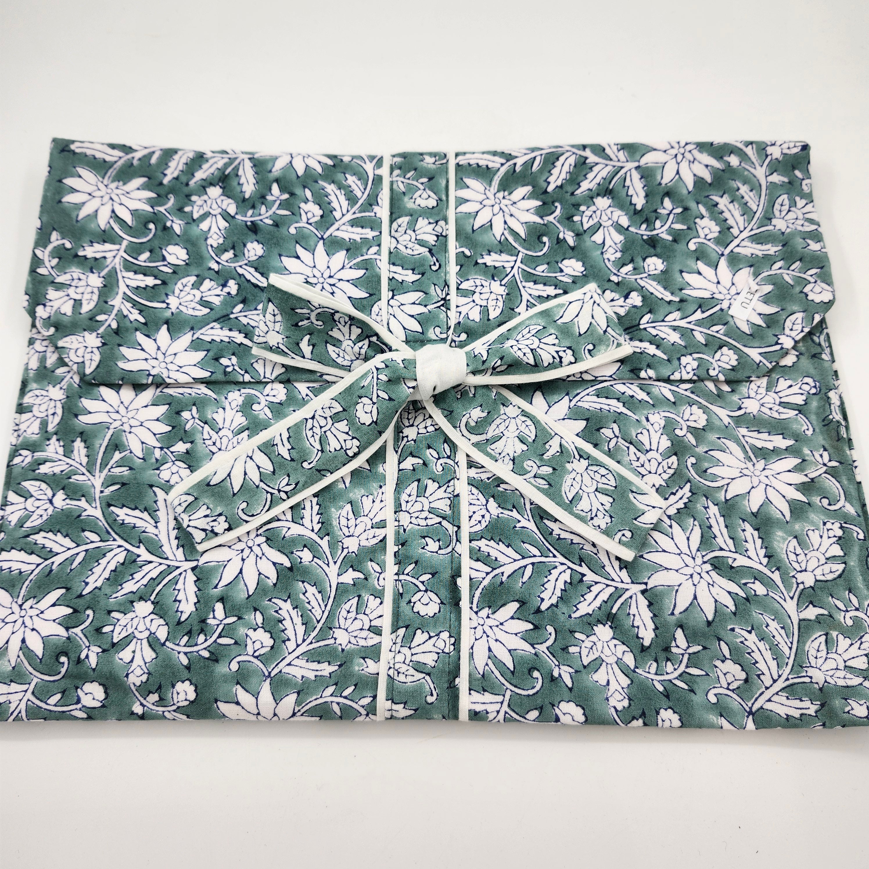 Block printed cotton short pyjama set, white floral print on teal, short-sleeved top and drawstring shorts