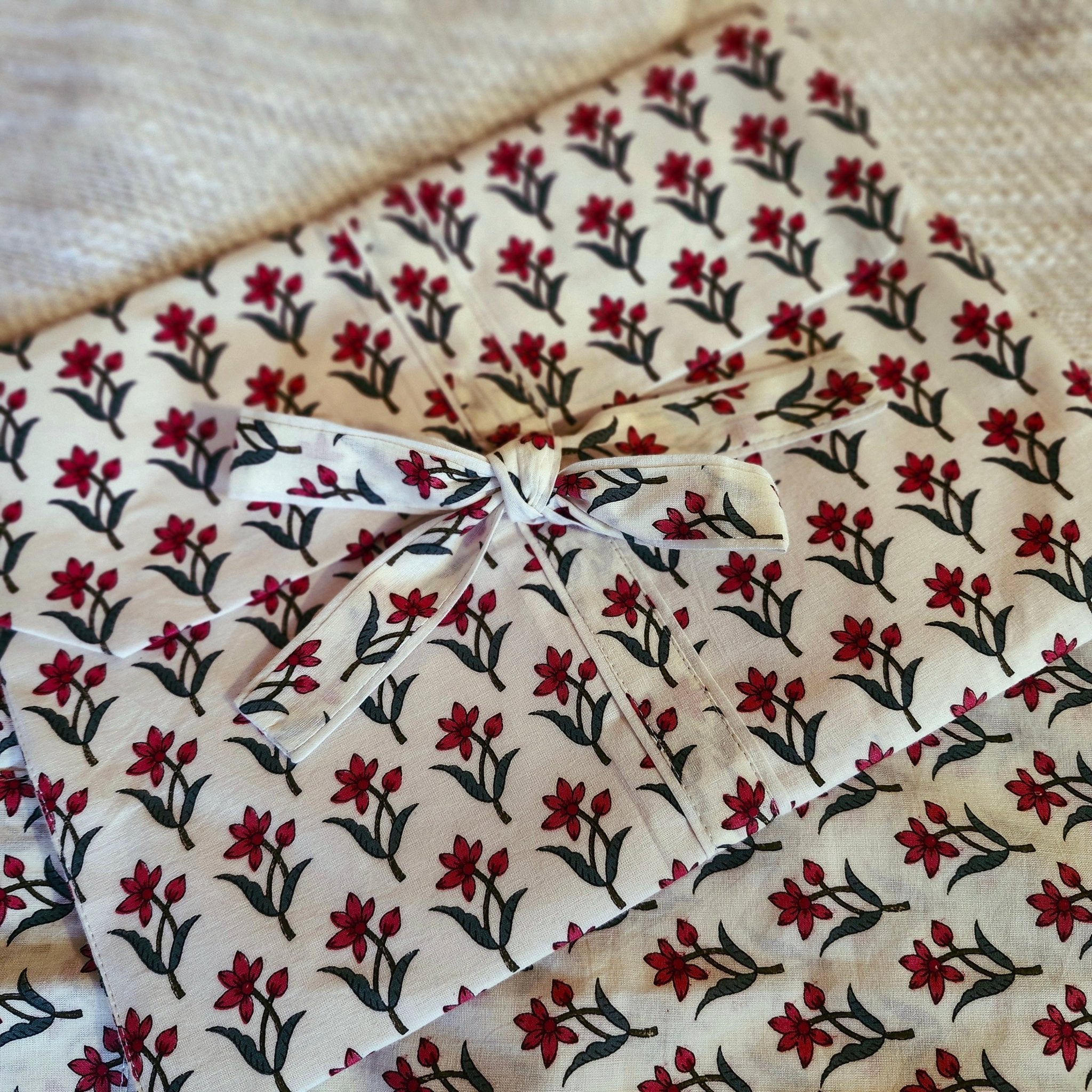 Block printed cotton short pyjama set, Rosalie print of small red flowers on cream, short-sleeved top and shorts