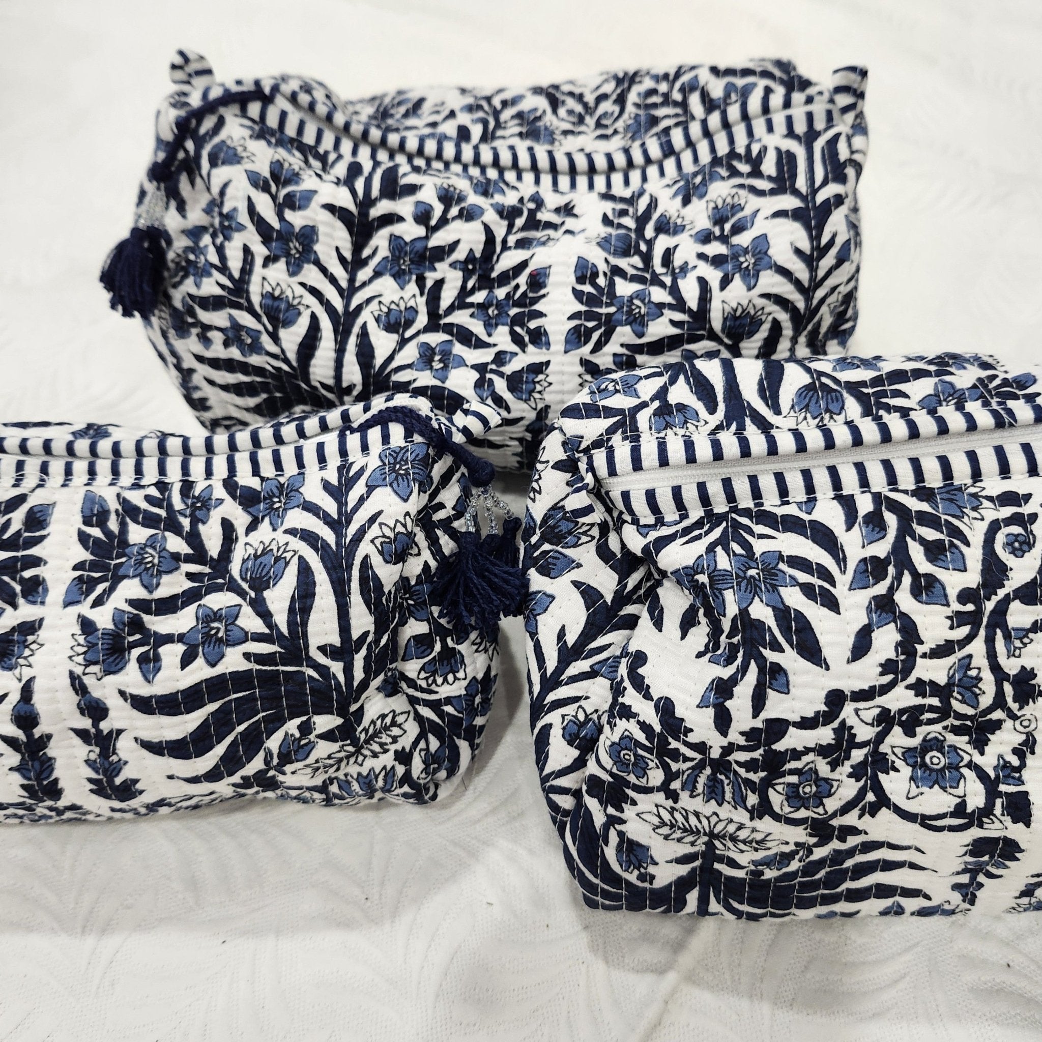 Block print cotton wash bag in floral blue, handmade toiletry and travel pouch for bathroom essentials