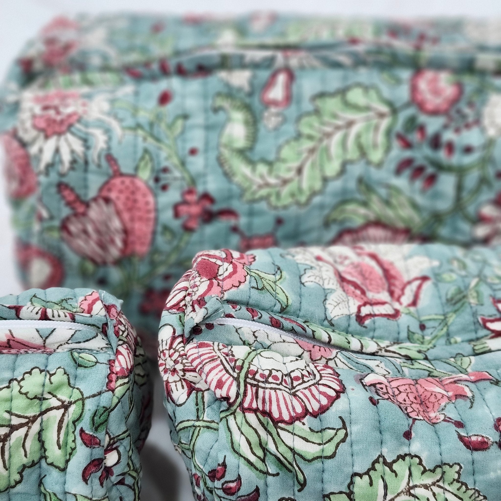 Block print cotton wash bag in hibiscus design, handmade toiletry and travel pouch for bathroom essentials, styled view