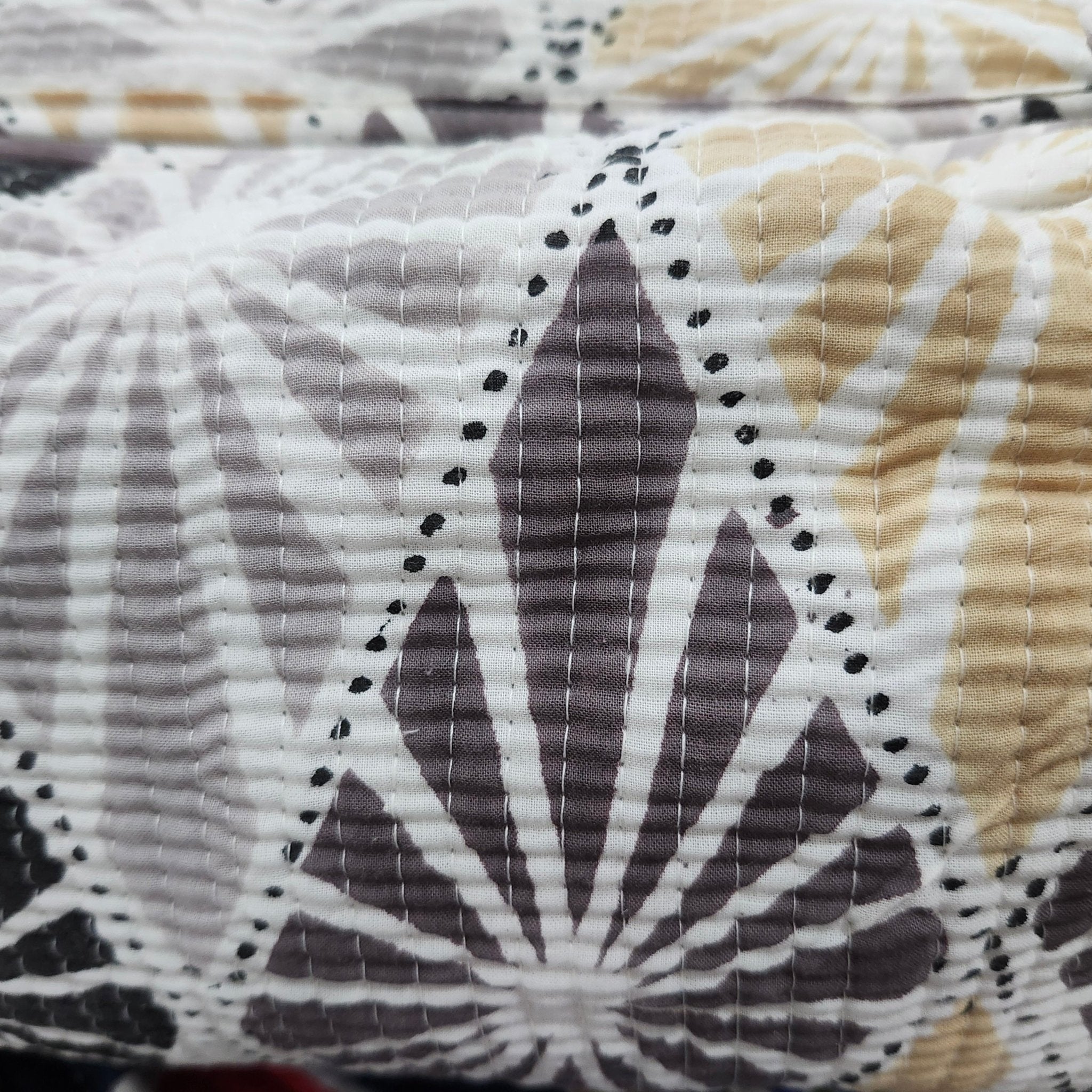 Block printed wash bag in tribal geometric print of tan, taupe, grey and black, lined, three sizes
