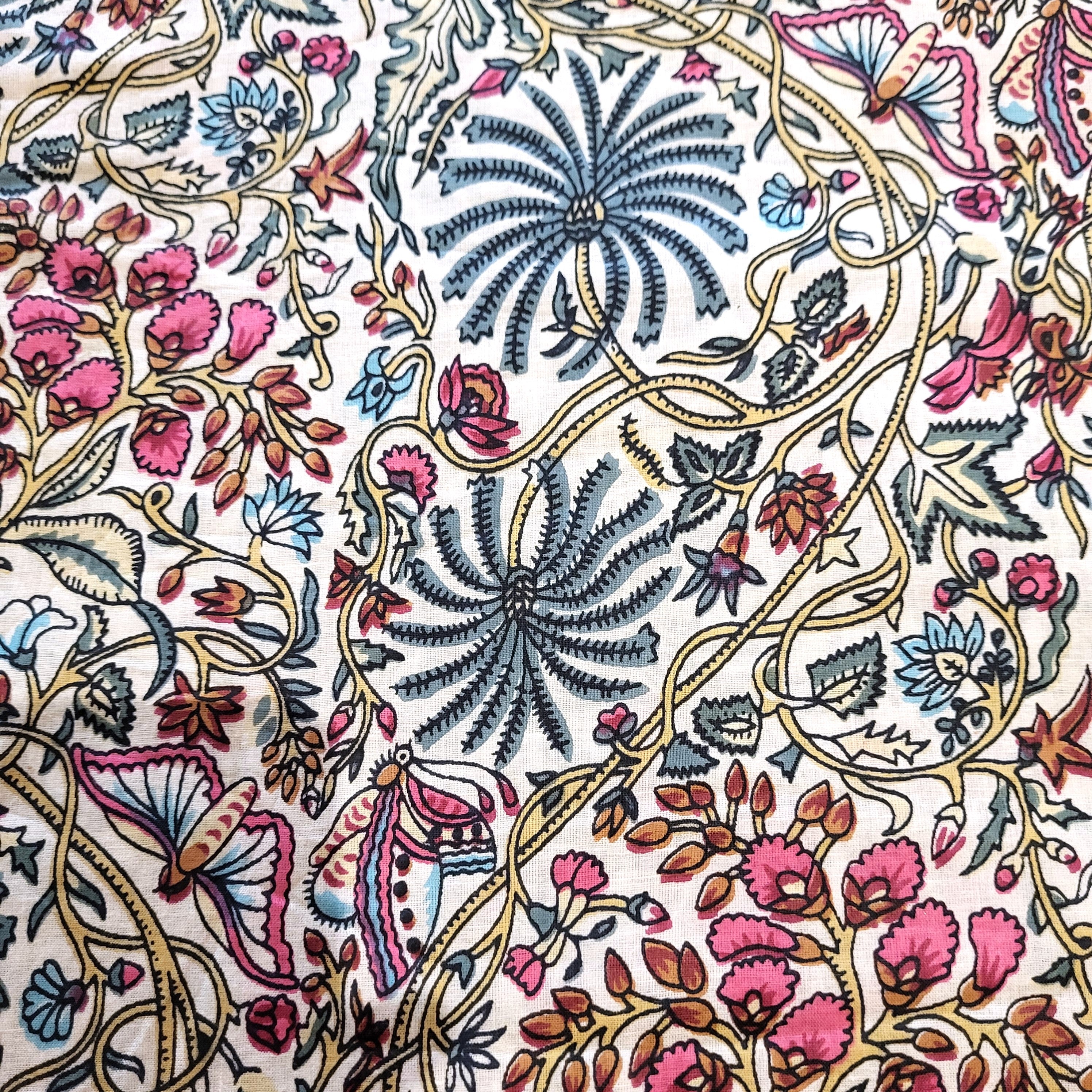 Cotton block-printed table runner in the rainforest pattern with palms, butterflies and flowers, white