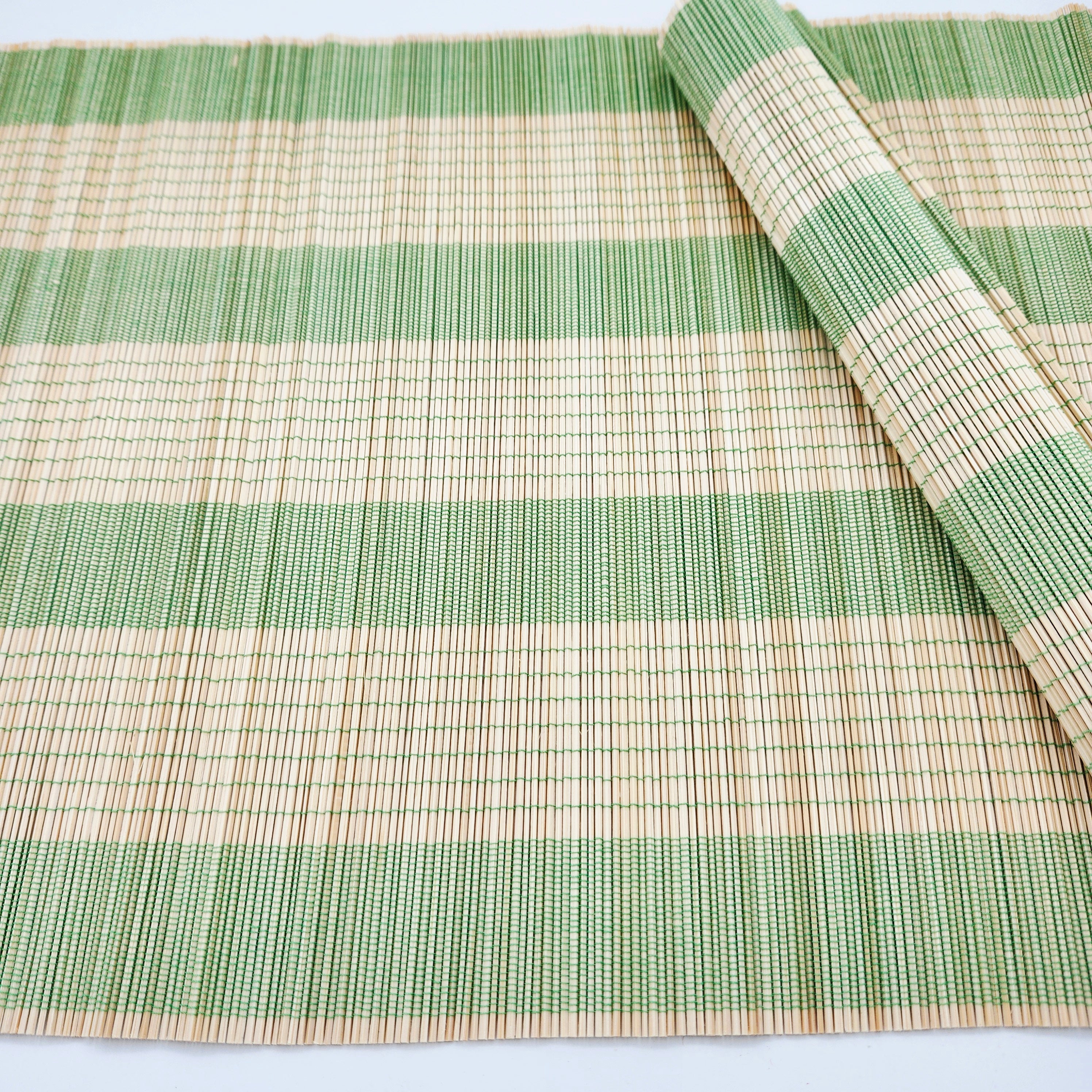 Bamboo placemat in lime, woven bamboo table mat, a natural eco-friendly dining accent in fresh lime green.