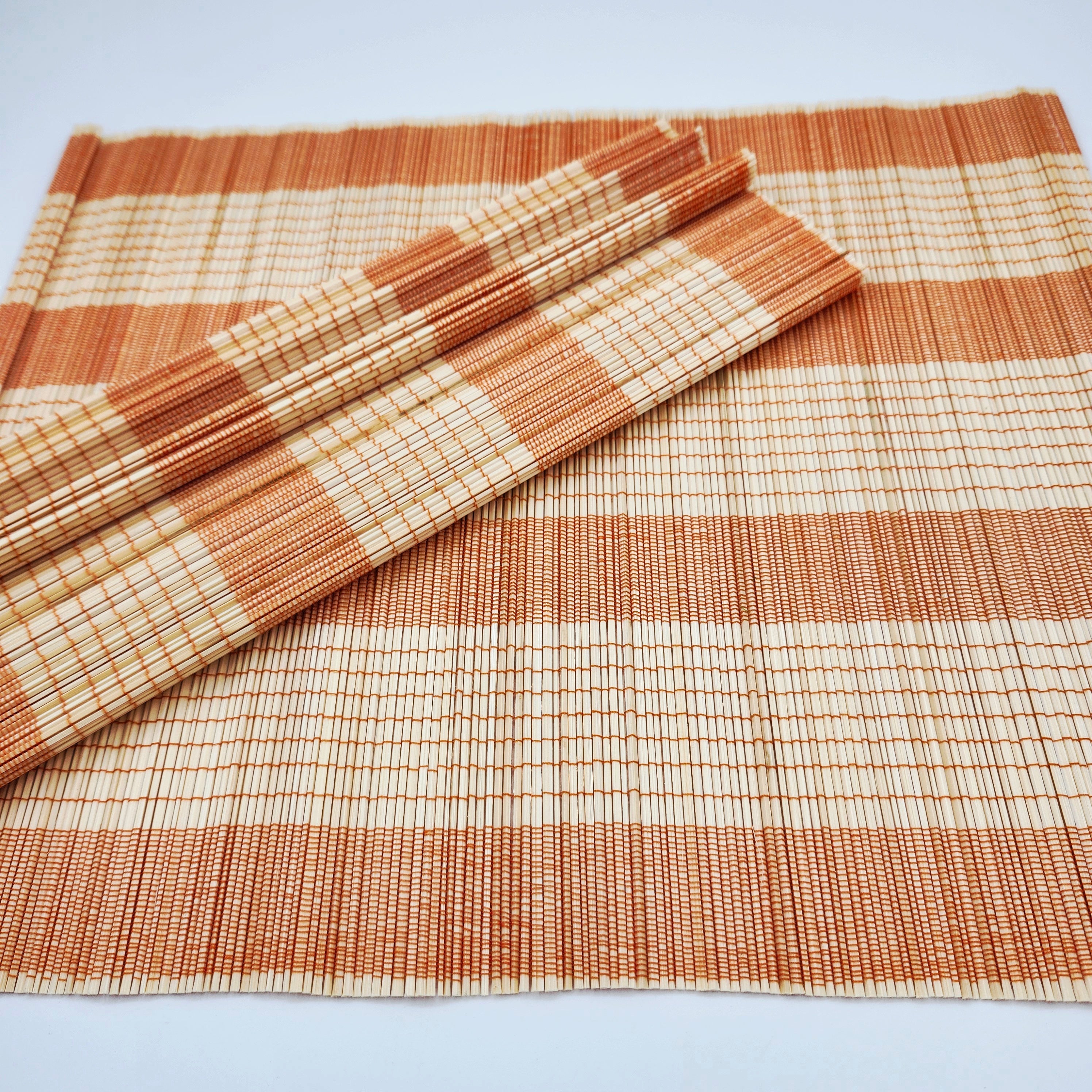 Bamboo Placemat Orange from Inside Living Singapore, detail view.