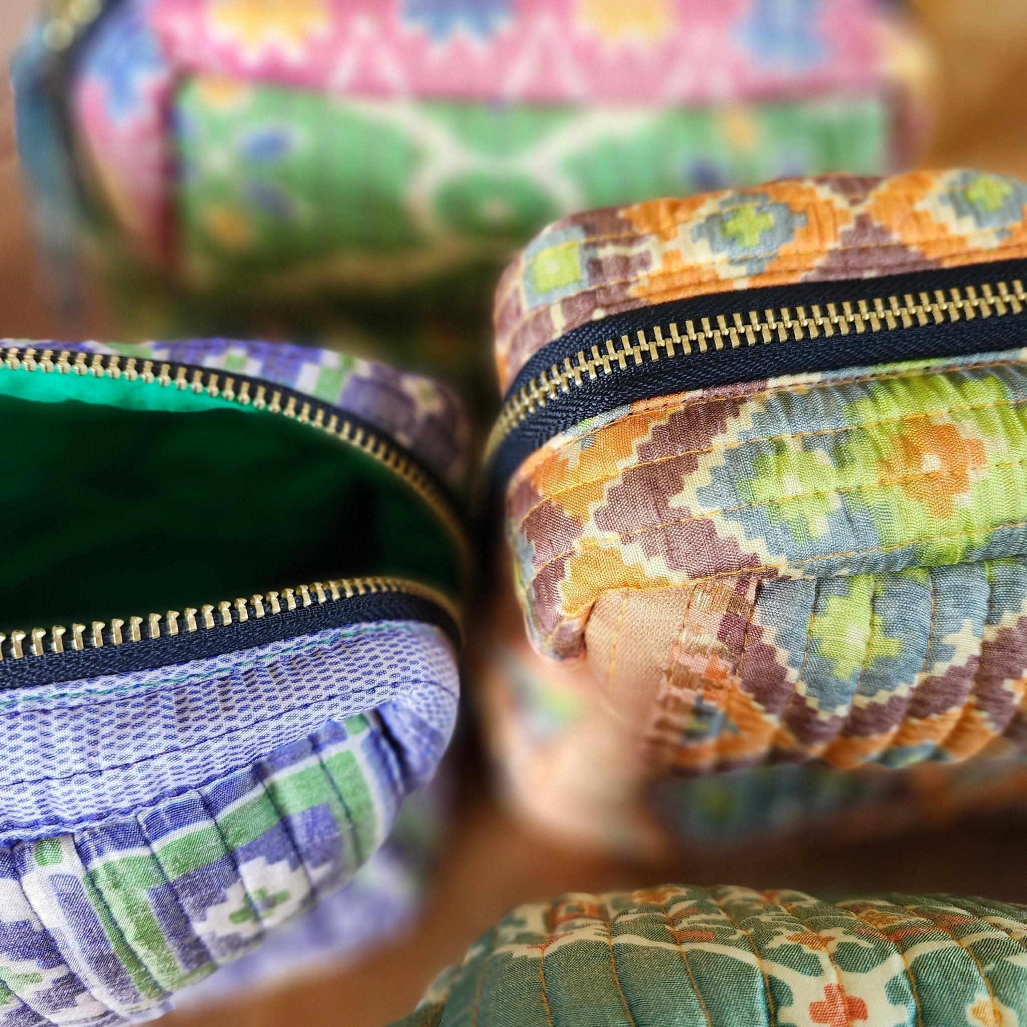 Cosmetic bag made from upcycled vintage silk sari fabric, quilted and silk-lined, 20 x 15 x 8cm