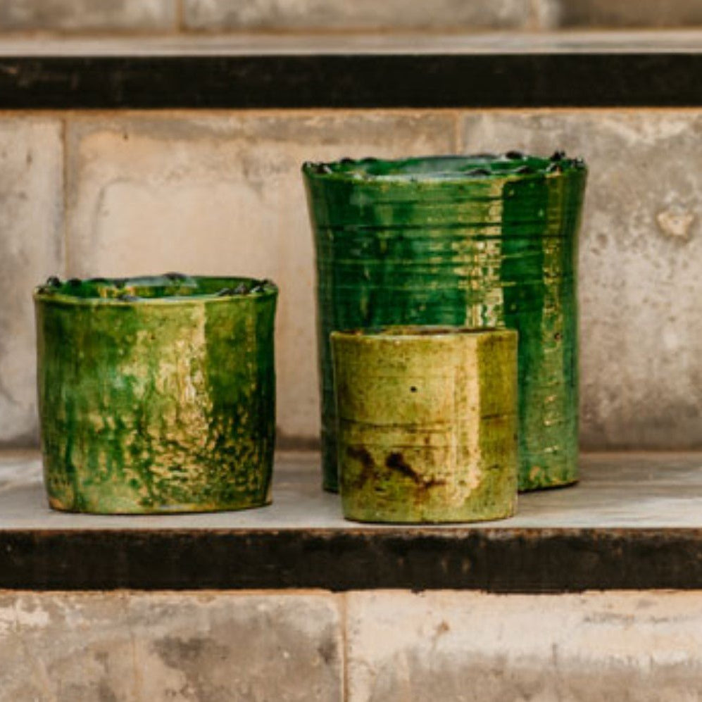 Hand-thrown Moroccan ceramic candle pot in the signature green Tamegroute enamel glaze, shown straight on