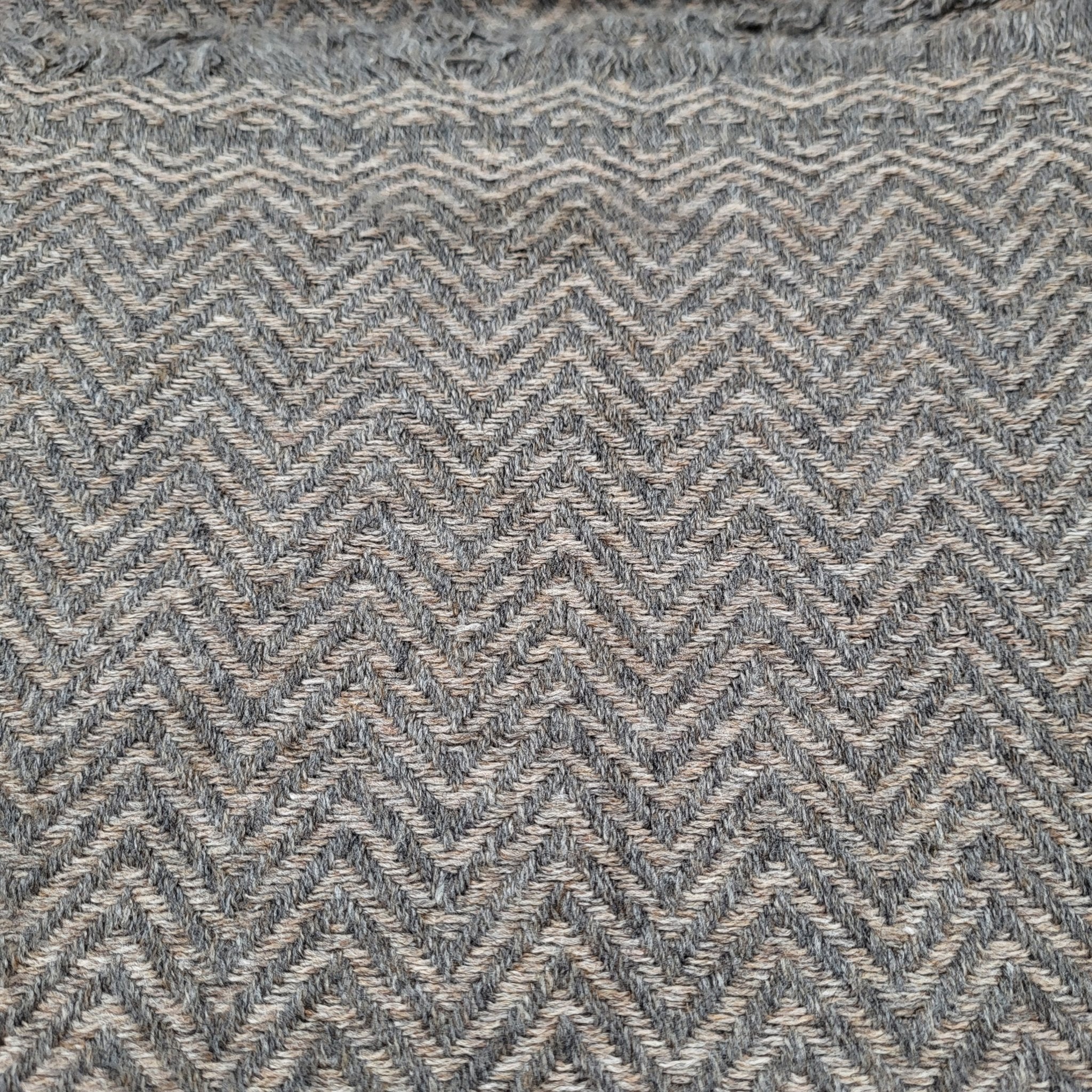 Cashmere Shawl Herringbone: soft woven wrap to wear or layer, from Inside Living Singapore. Lifestyle styling shot.