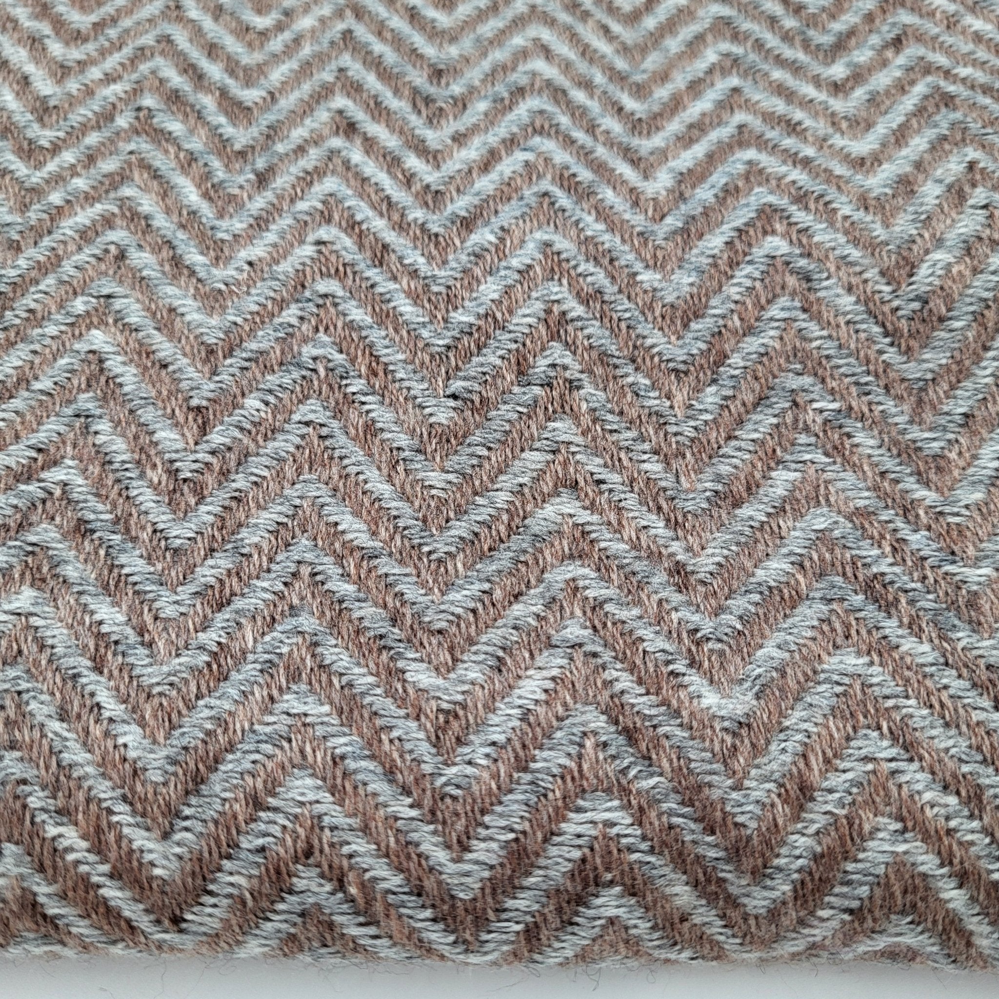 Cashmere Shawl Herringbone: soft woven wrap to wear or layer, from Inside Living Singapore. Styled in a home setting.