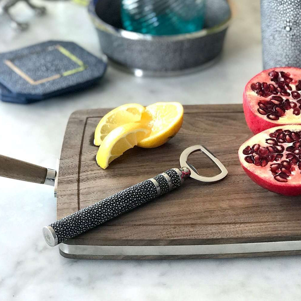 Bottle opener in stainless steel with a charcoal faux shagreen handle, comfortable to hold and easy to use