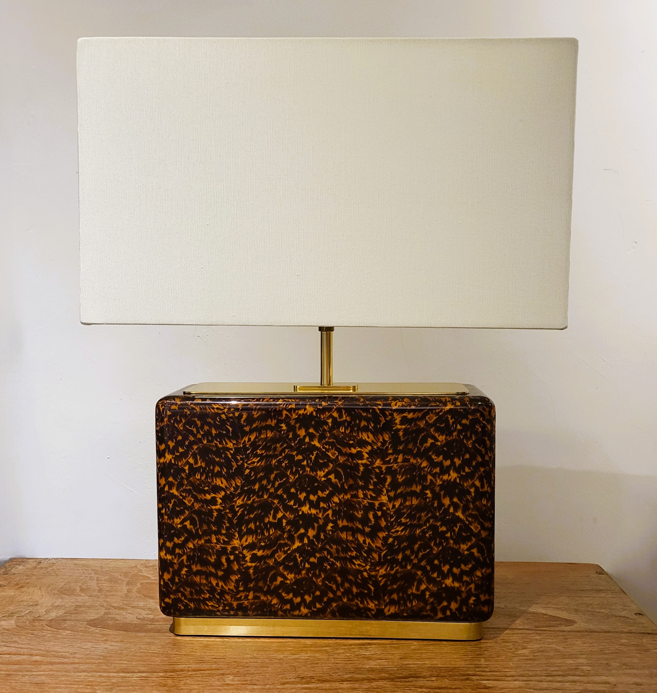Faux tortoise shell table lamp from Inside Living, decorative home lighting with a warm patterned amber-toned finish