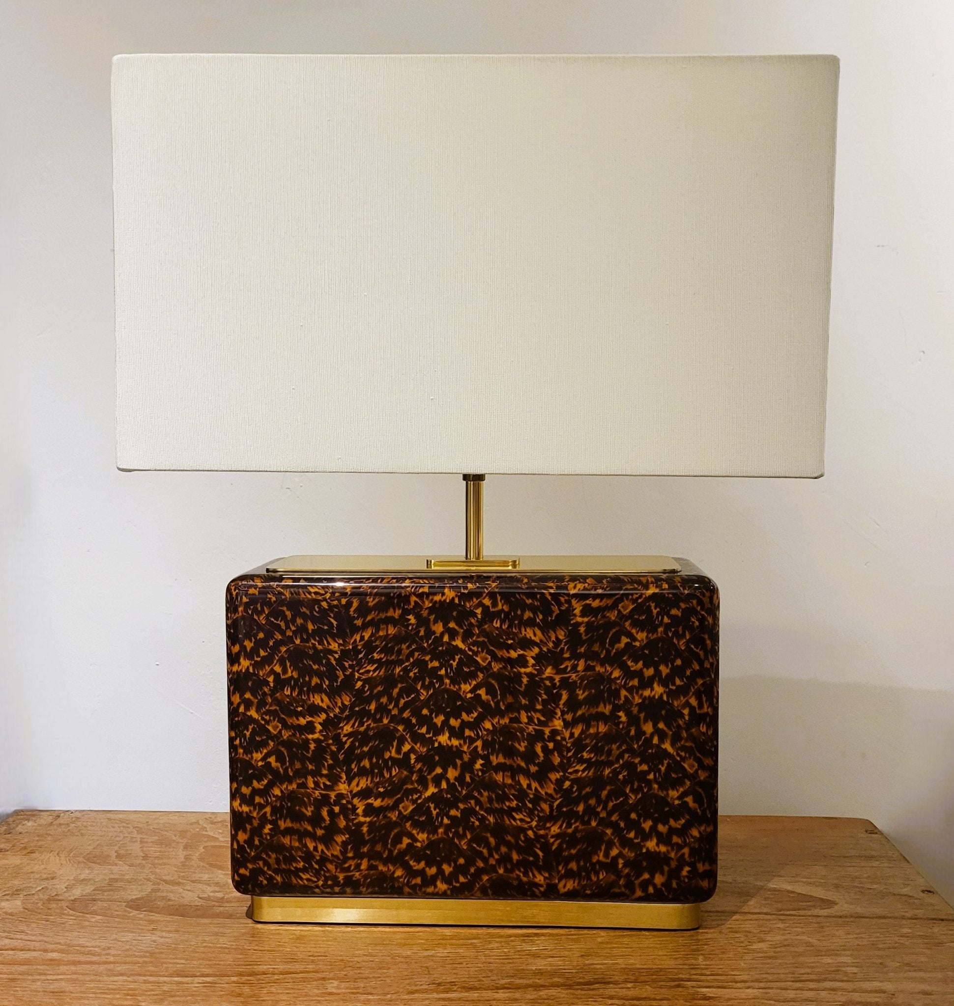 Faux tortoise shell table lamp from Inside Living, decorative home lighting with a warm patterned amber-toned finish