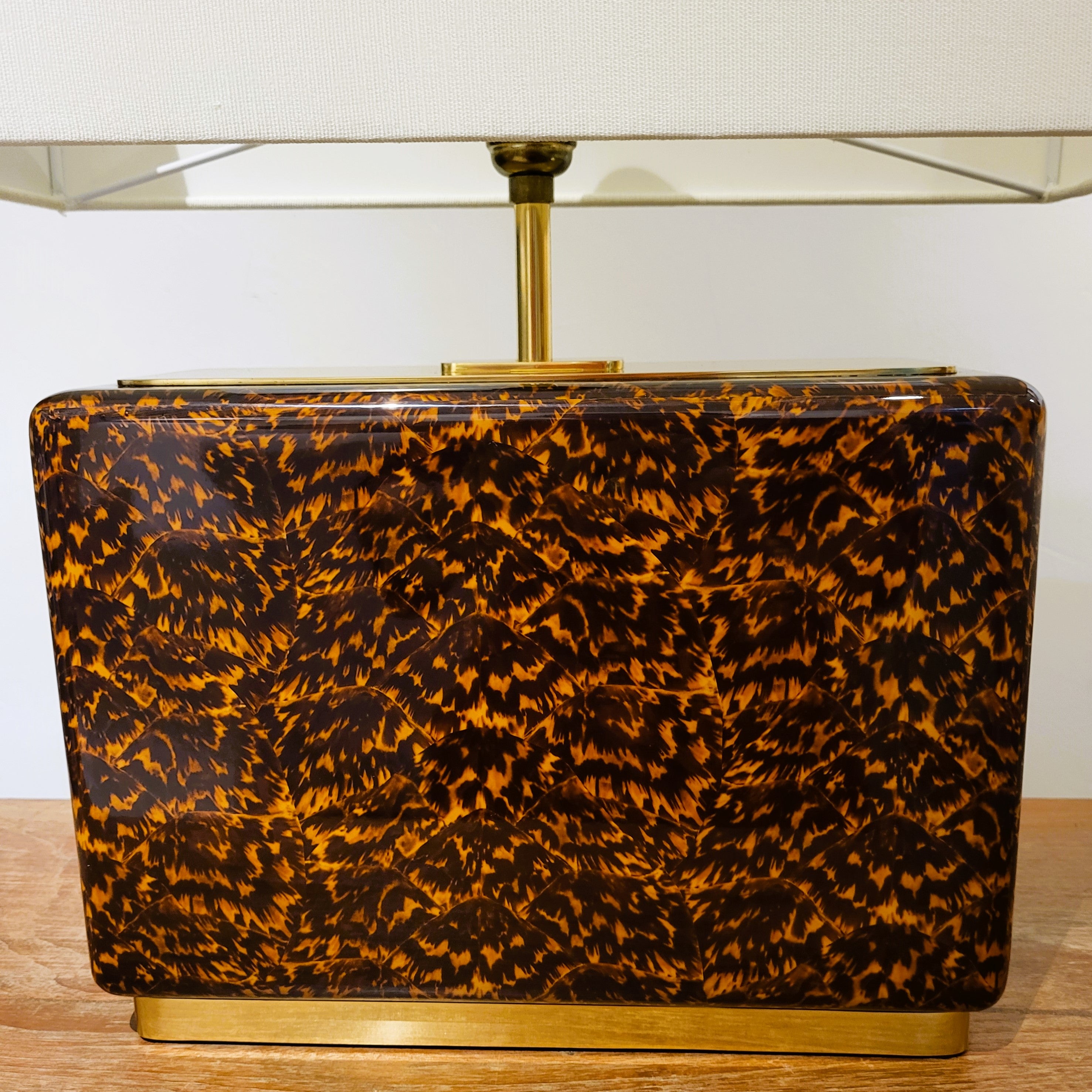 Faux tortoise shell table lamp from Inside Living, decorative home lighting with a warm patterned amber-toned finish