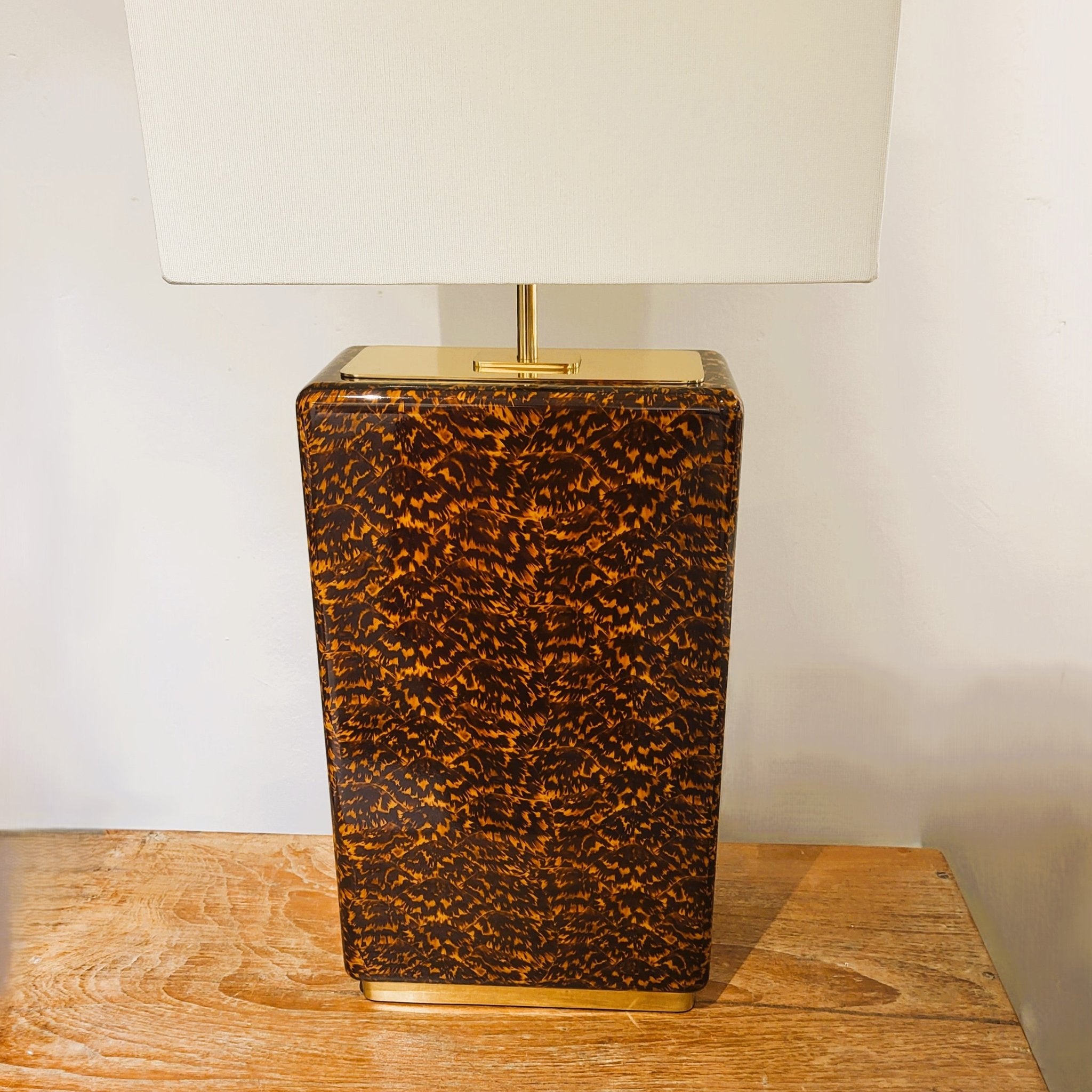 Faux tortoise shell table lamp from Inside Living, decorative home lighting with a warm patterned amber-toned finish