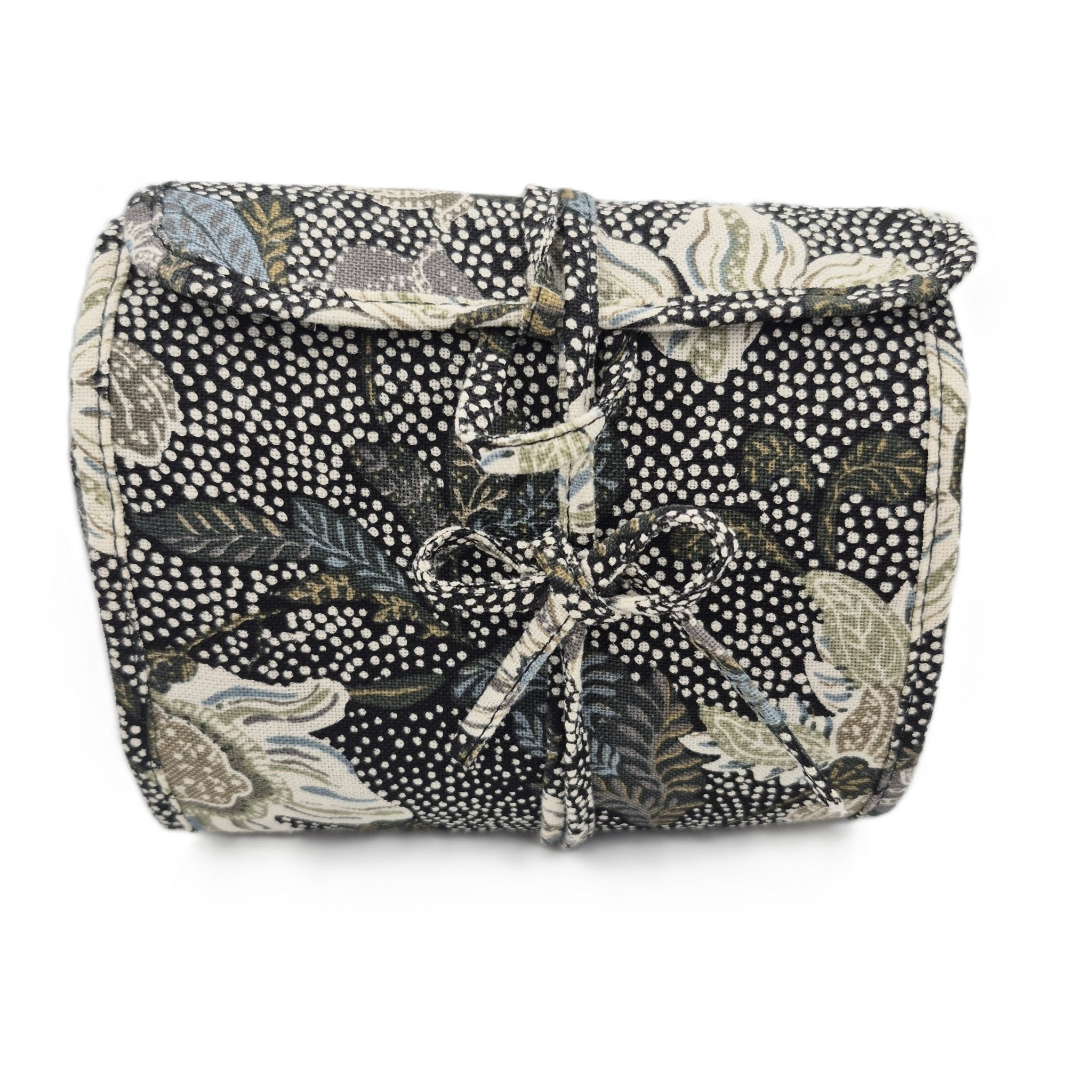 Hanging cosmetic bag in flower linen with six zipped compartments, leather tags and nylon lining