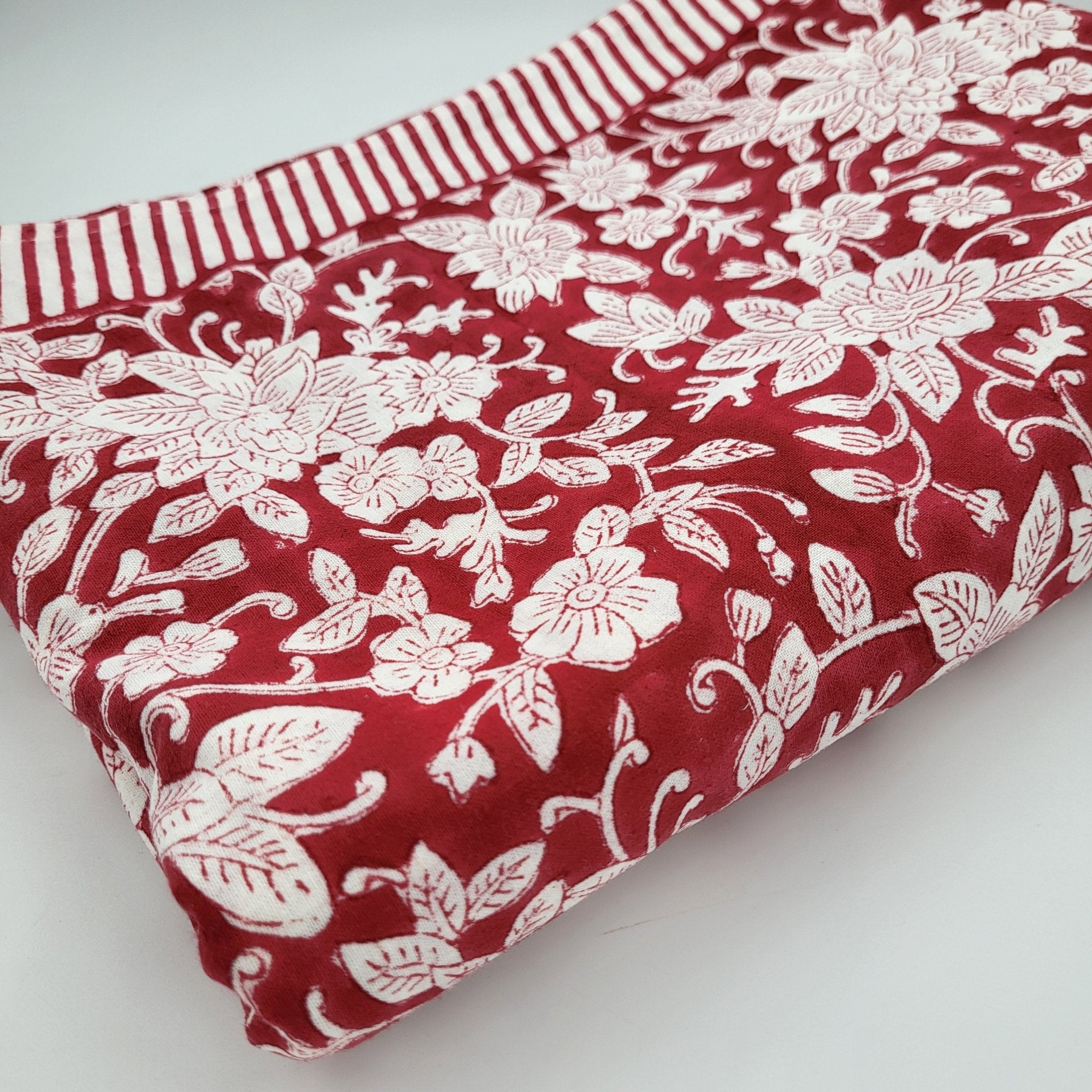Deep red block print cotton tablecloth with white floral pattern and striped border, various sizes