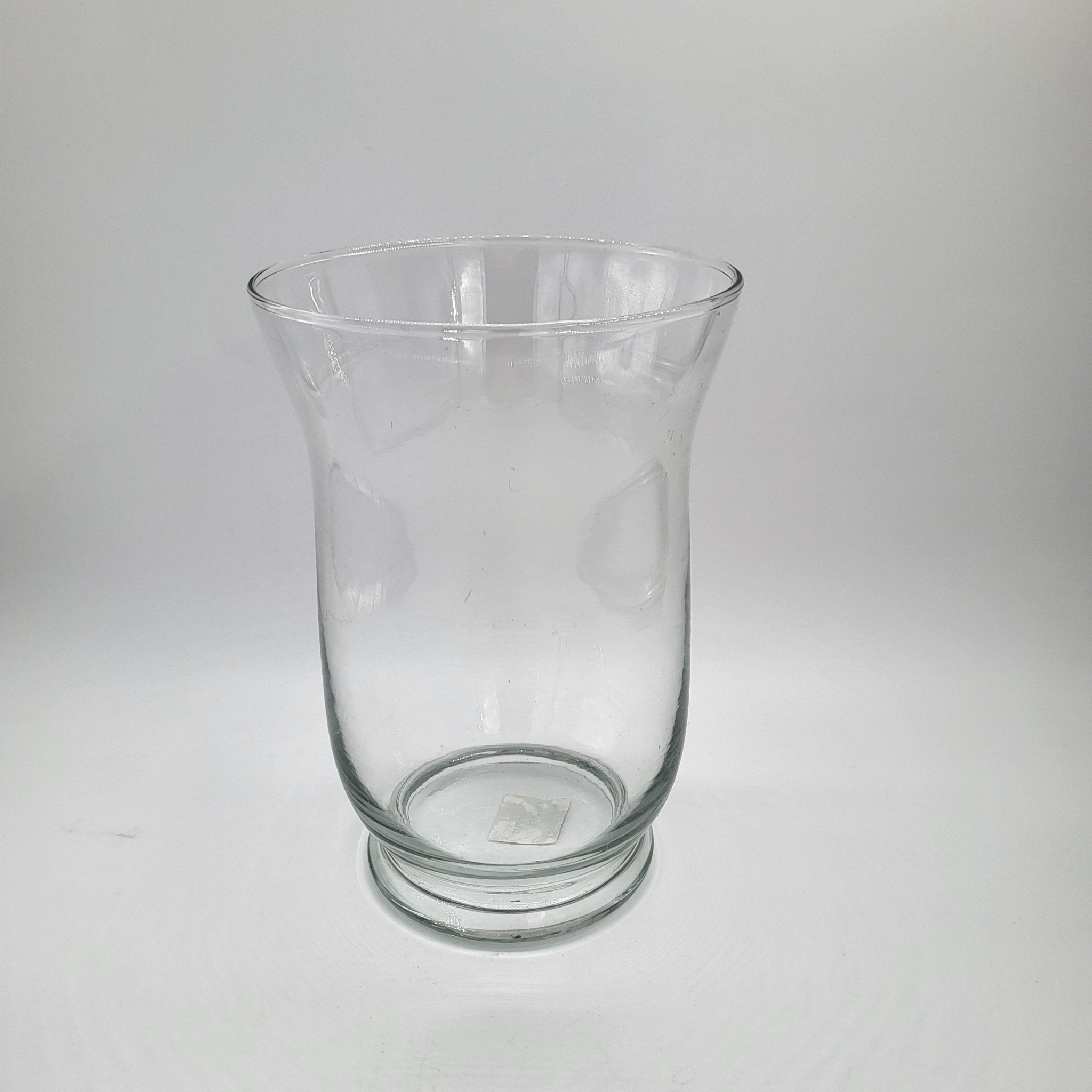 Clear glass vase or hurricane lamp for flowers or pillar candles, available in three sizes