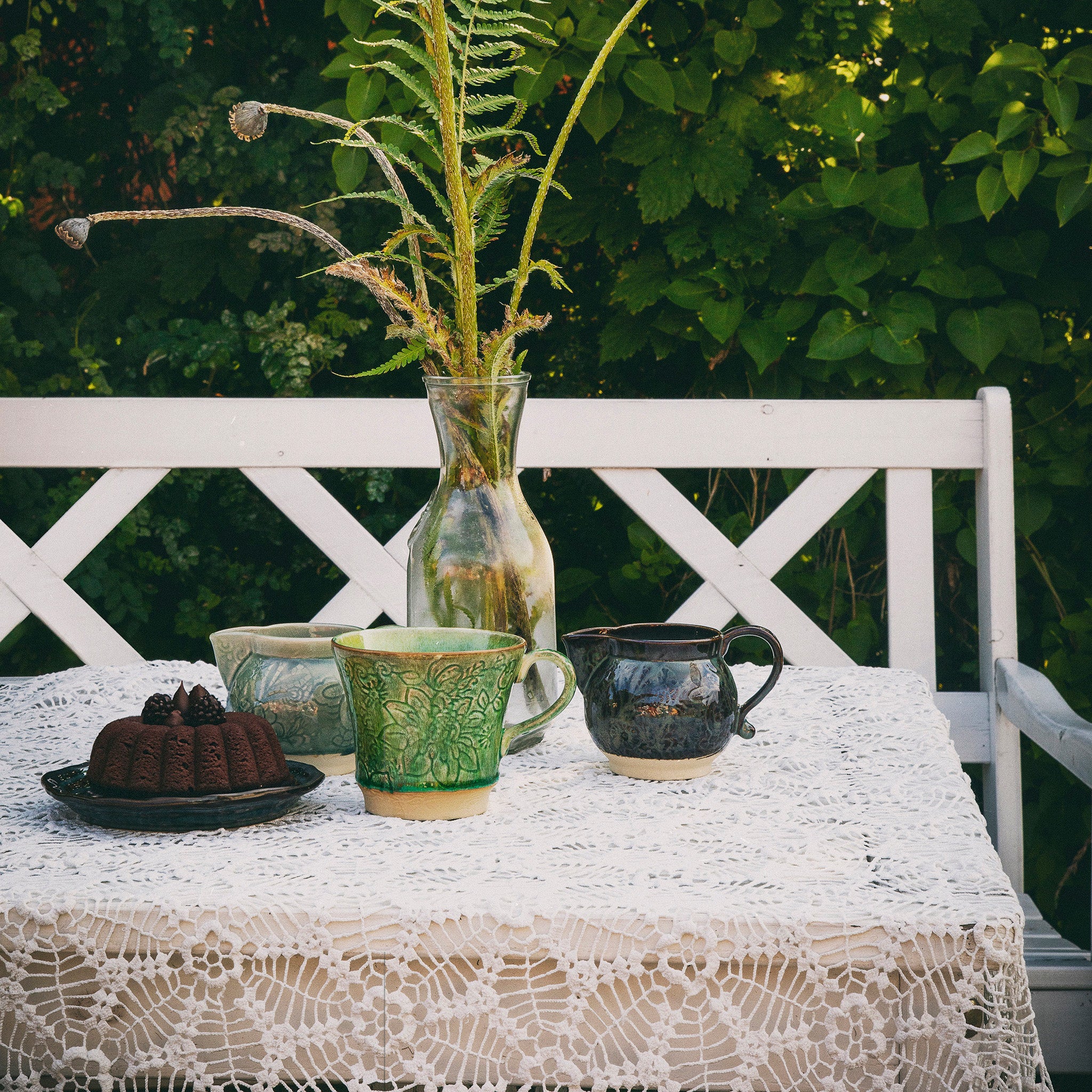 Ceramic Creamer detail view, plates from Inside Living Singapore.