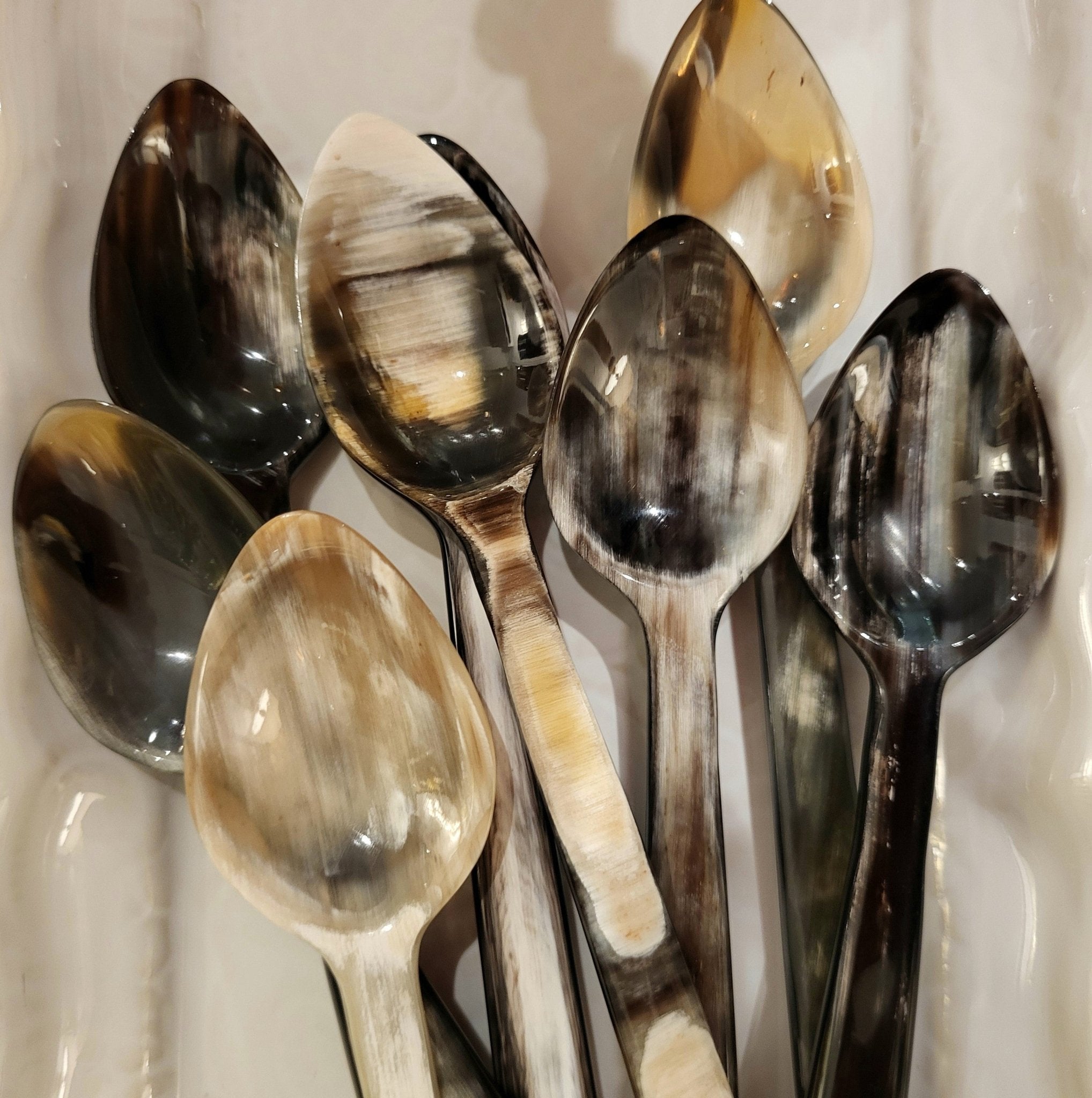 Tea spoon handcrafted from horn, each naturally unique in colour and marking, approximately 15 cm long