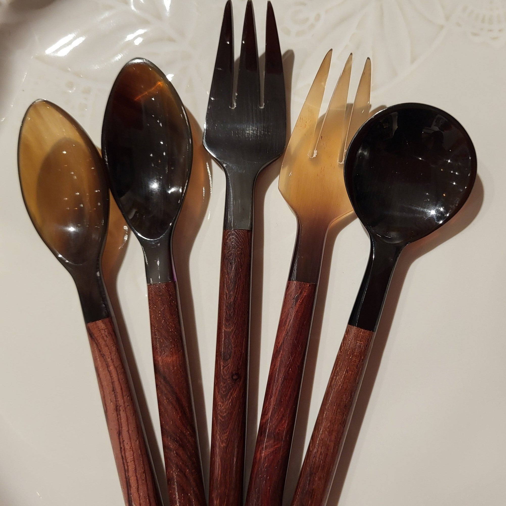 Dessert or tea spoon handcrafted from horn with a plain wooden handle, approximately 14 cm long