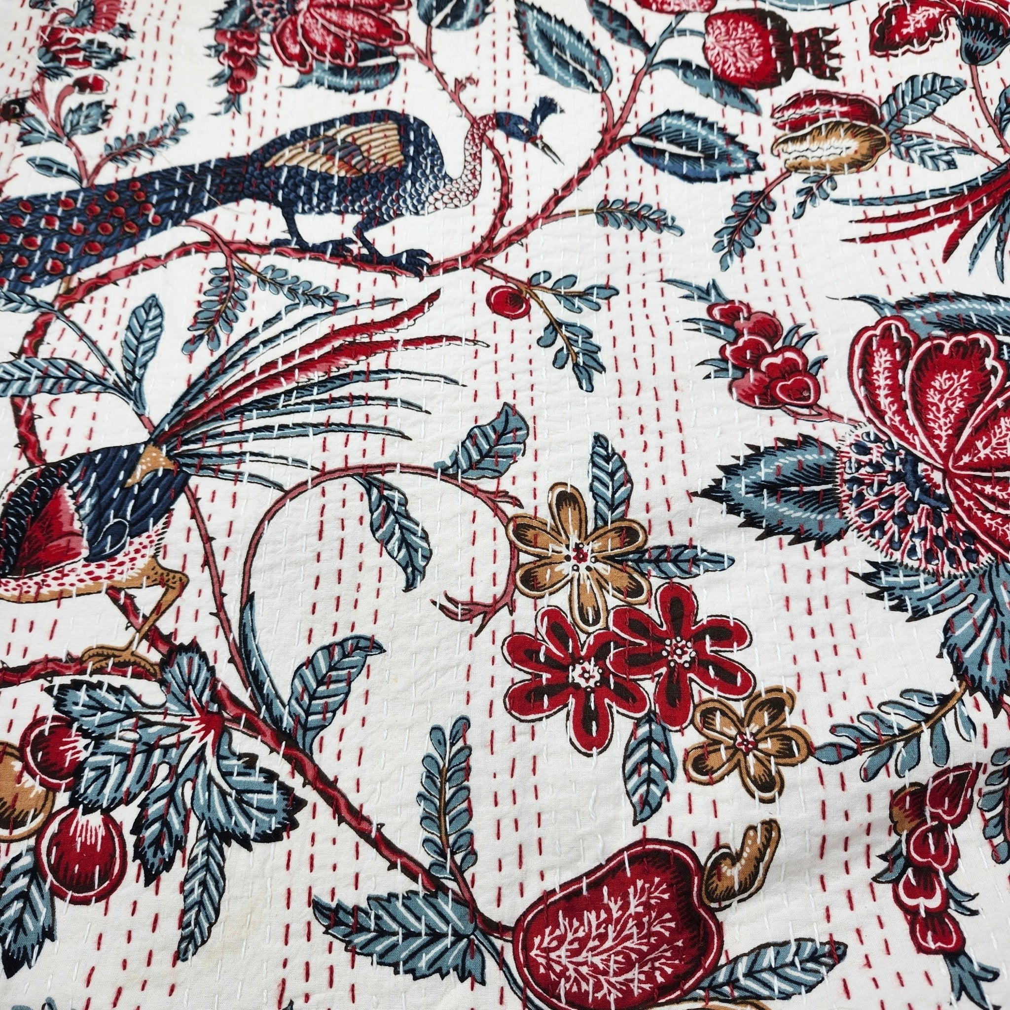 Kantha cotton throw and bedspread in peacock design, handmade quilted bedcover with running-stitch detail, detail view