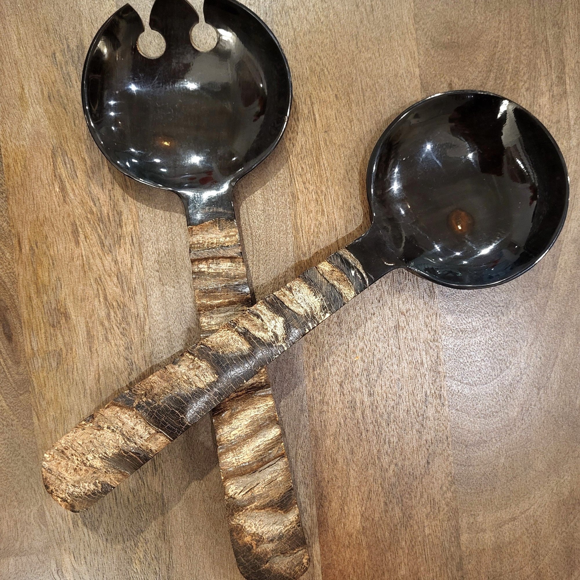 Set of 2 horn salad servers with handles carved to resemble wood, a natural handcrafted serving pair