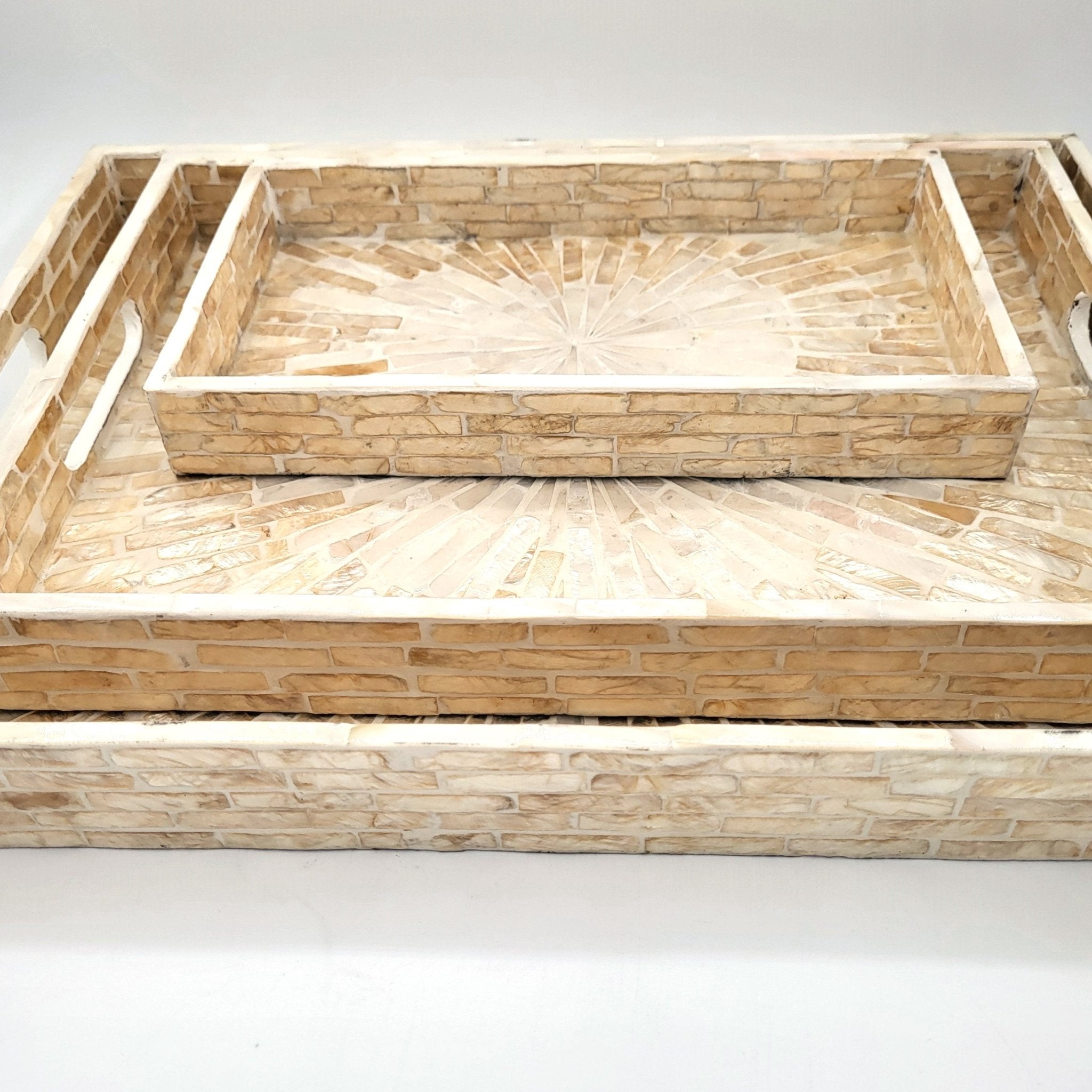 Ivory mother of pearl inlay serving tray with sunburst pattern on wood base, available in four sizes