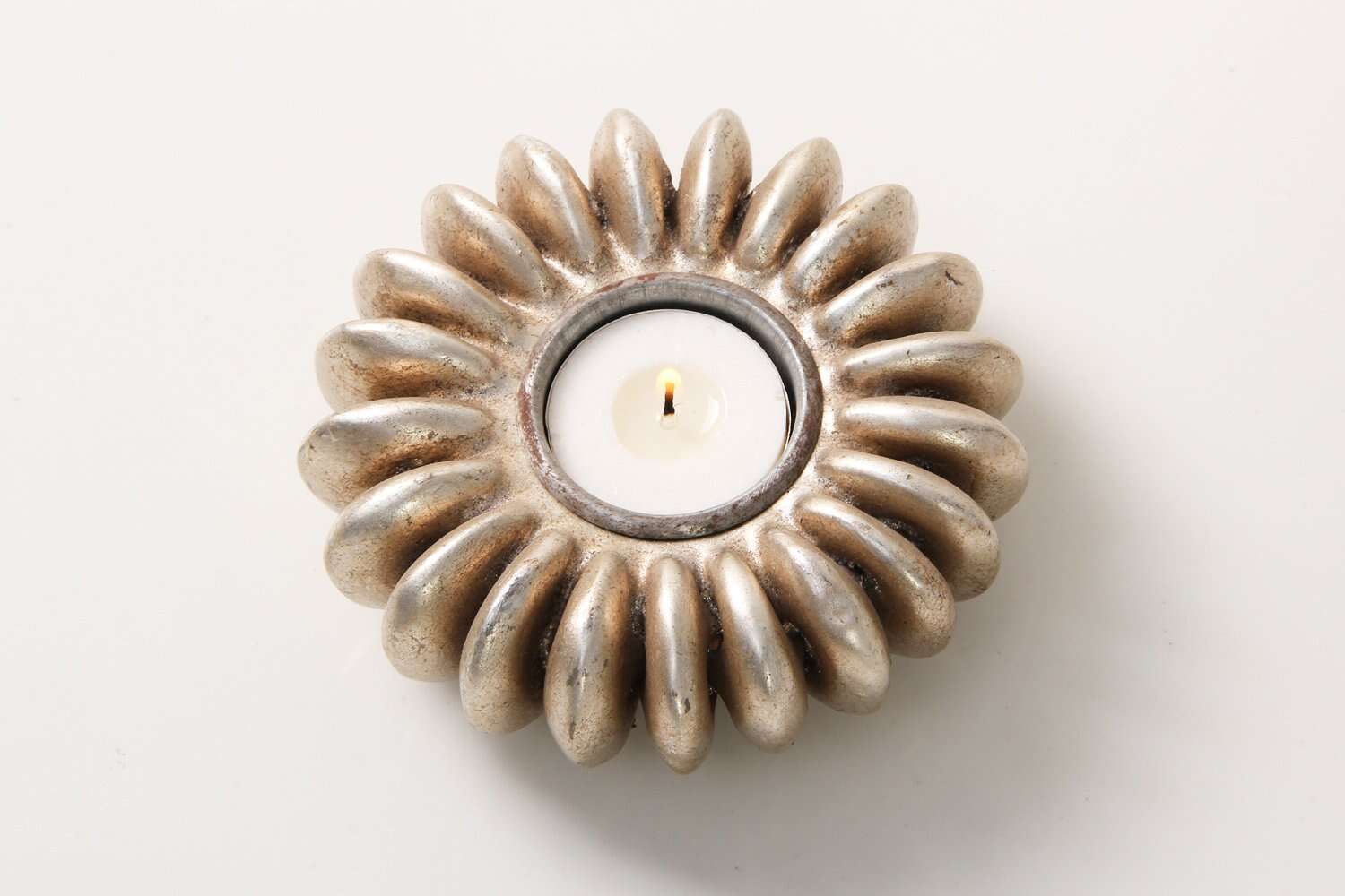 Tea light holder cast from a sandbox seed pod in resin, antique silver finish, 12 x 12 cm for table or kitchen
