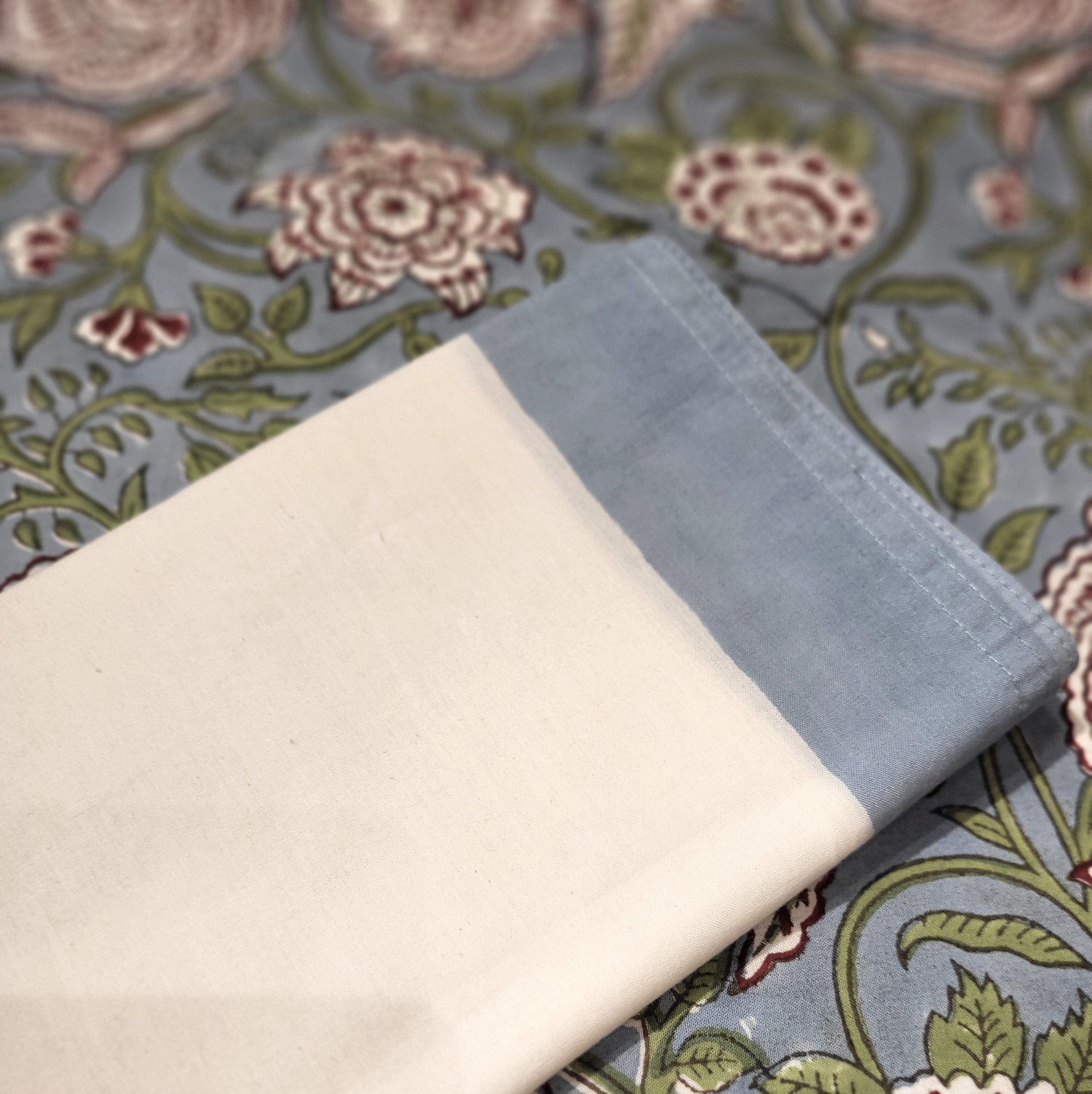 Set of six cotton napkins with a solid blue block-printed border, 48 x 48 cm, machine washable