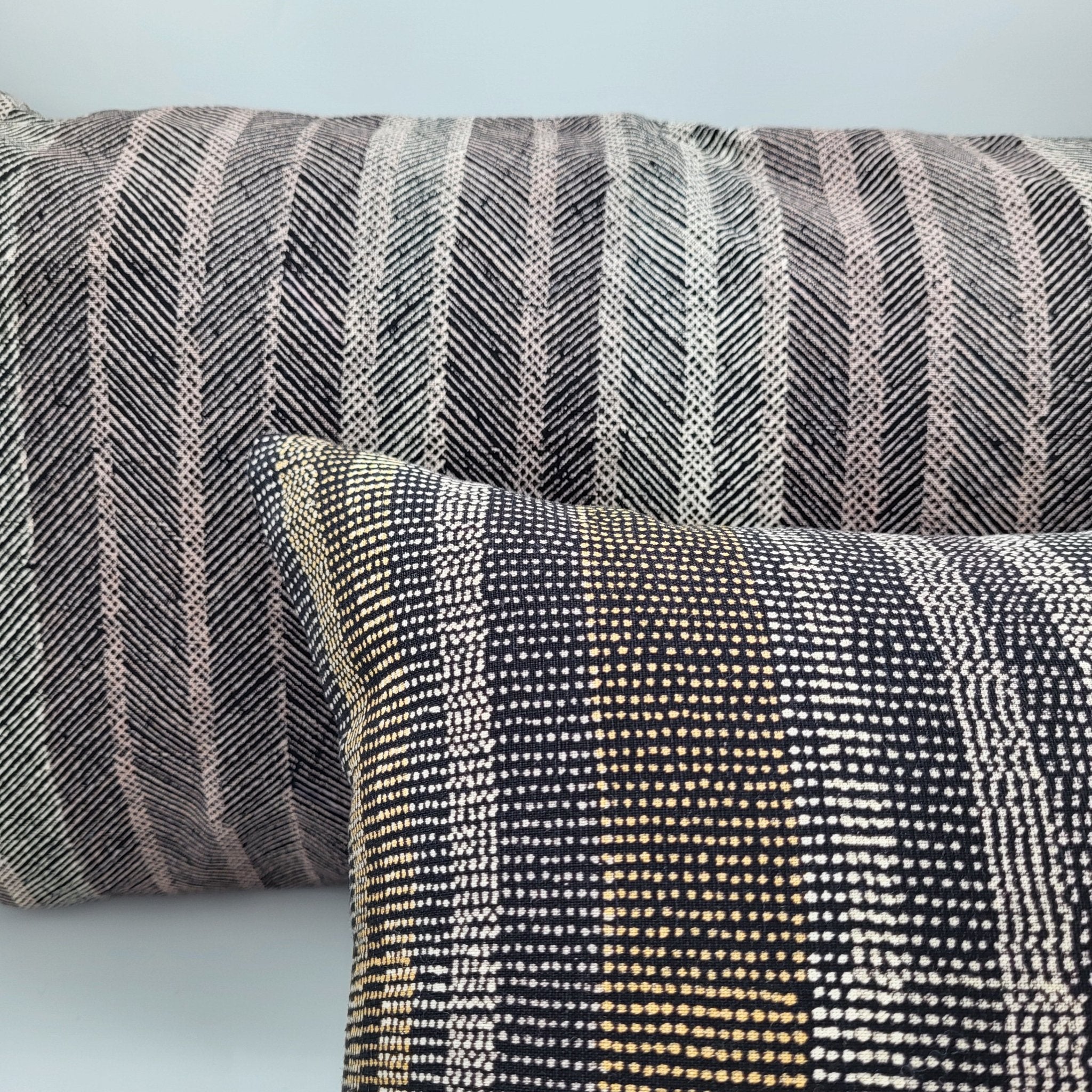 Hand-dyed cotton linen cushion cover with a fine stripe in black, grey and beige, available in two sizes