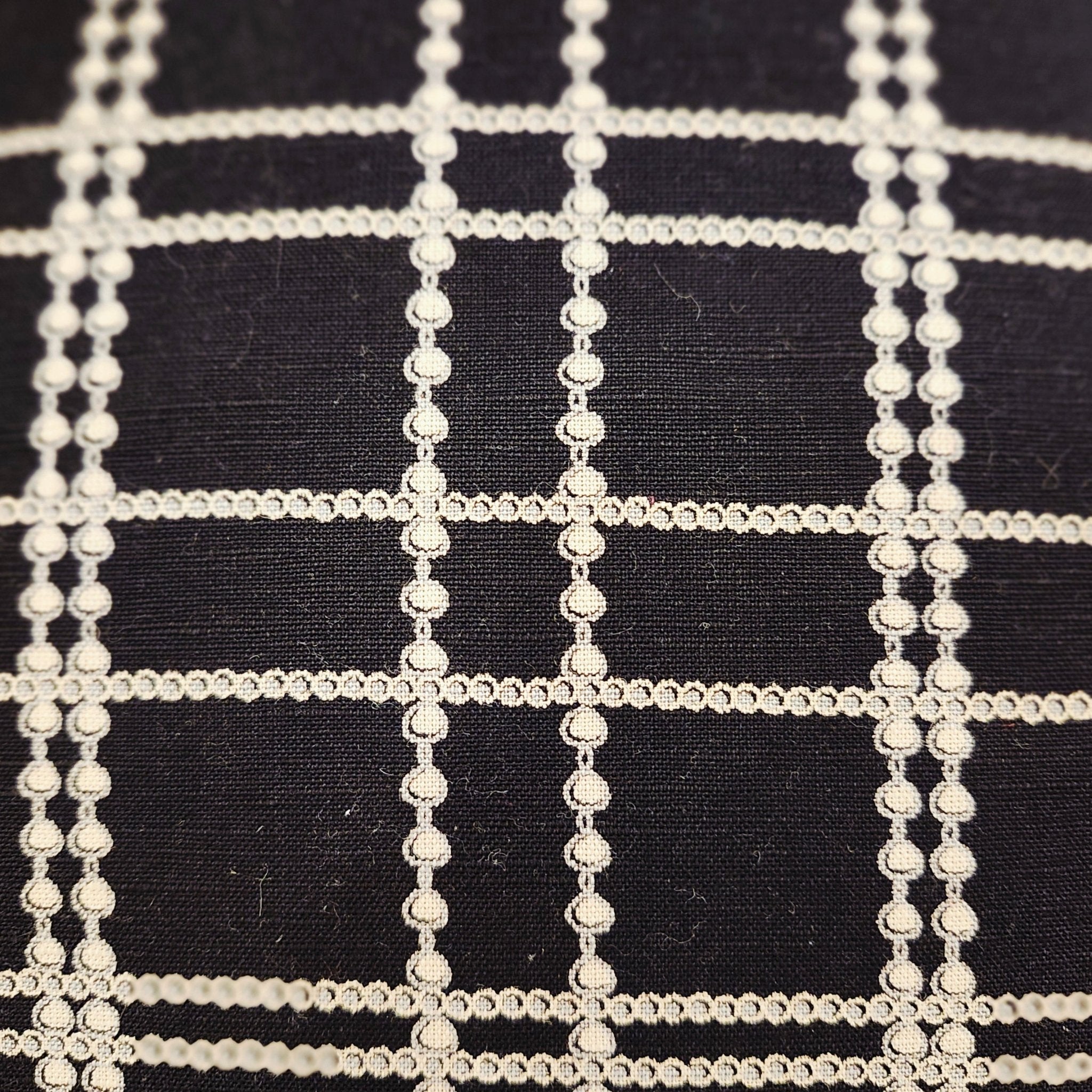Cushion Cover 'Plaid', decorative cushion cover at Inside Living Singapore. Side view.