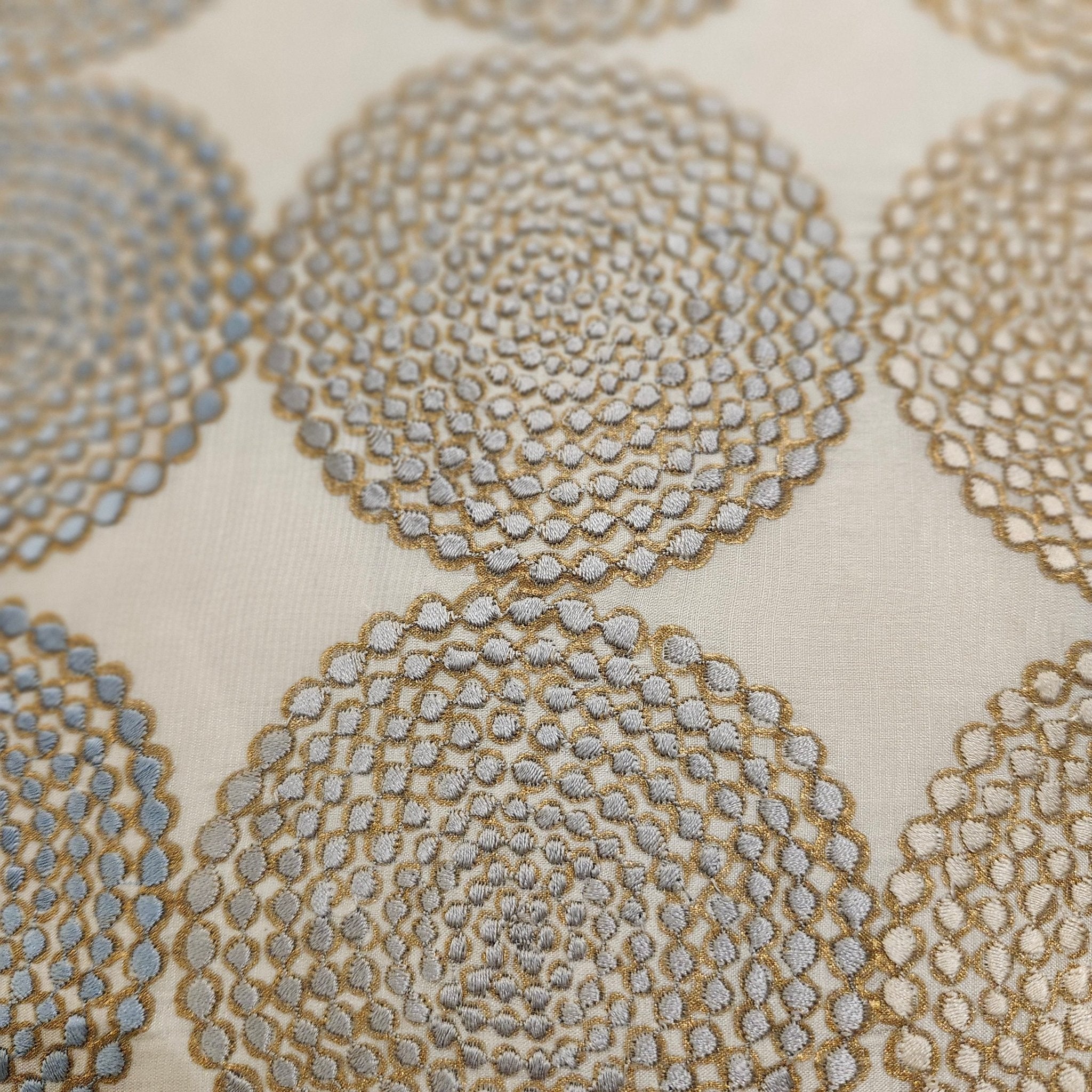 Embroidered Cushion Silk Circles, decorative cushion cover at Inside Living Singapore. Side view.