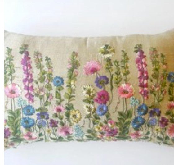 Raw silk cushion embroidered with Himalayan wildflowers, highlighted with metal sequins, 30 x 50cm.