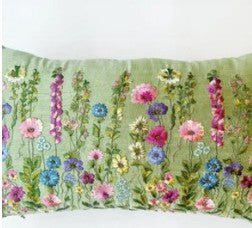 Detail of the hand-driven machine embroidery and metal sequin highlights on this raw silk cushion.