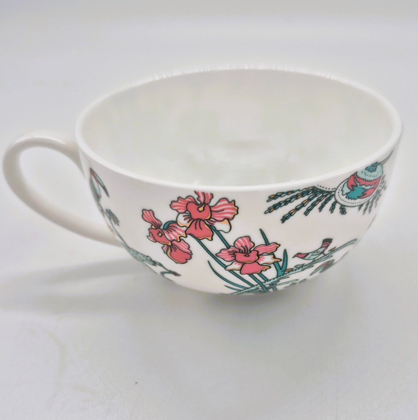 Singapore Toile cup and saucer from Inside Living, fine ceramic set with heritage East-meets-West toile pattern, side view