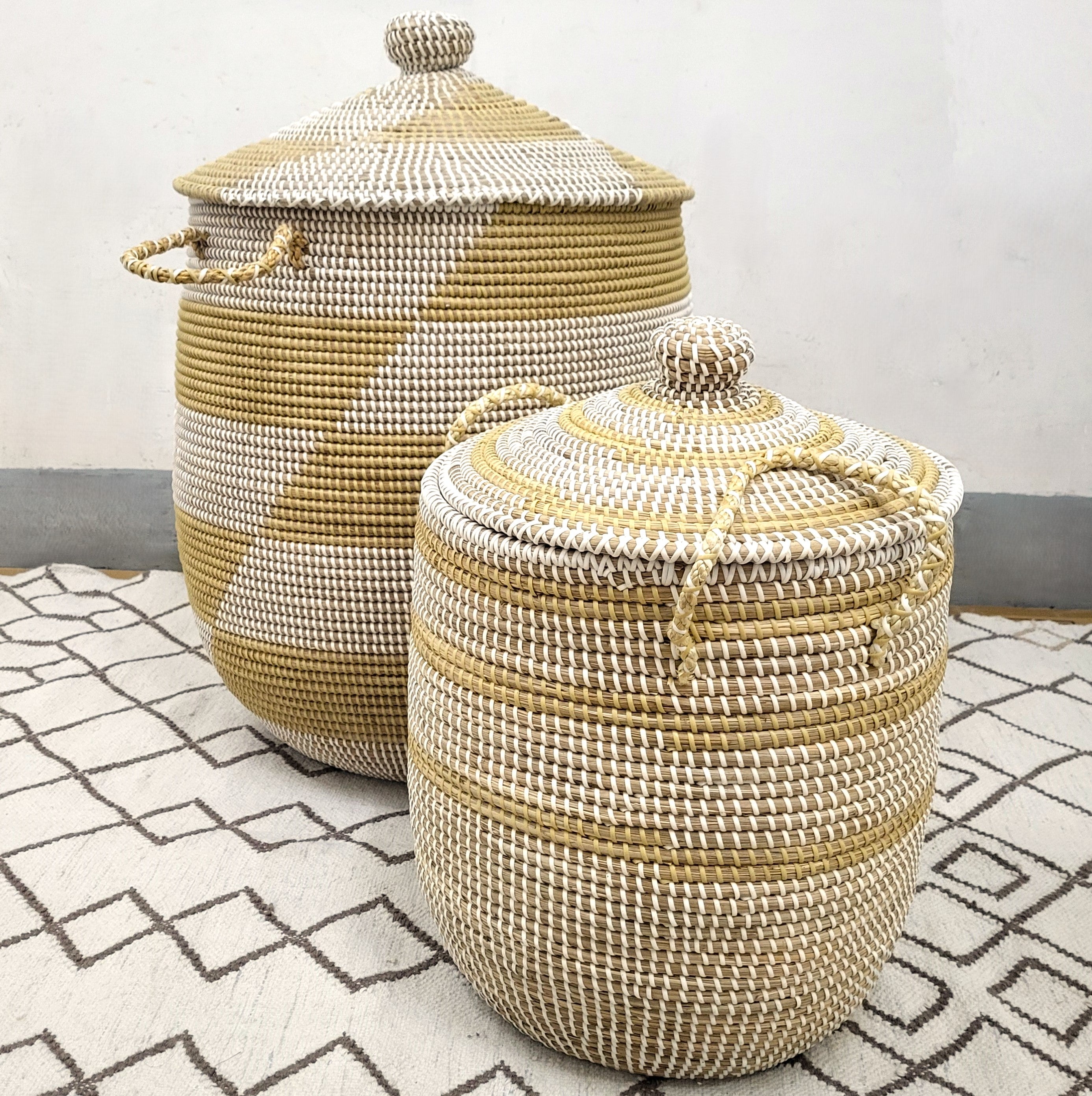 Handwoven seagrass laundry basket with white detailing, handles and a lid, in small, medium or large