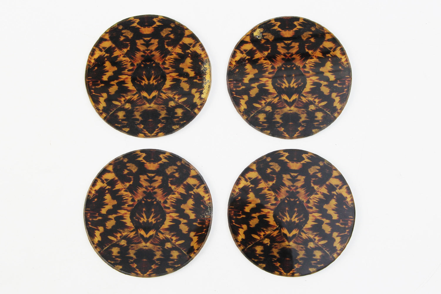 Set of 4 drinks coasters in tempered glass with a faux tortoiseshell print, 10 x 10 cm for coffee or dining table