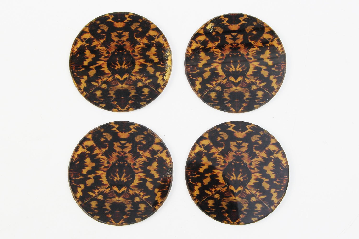 Set of 4 drinks coasters in tempered glass with a faux tortoiseshell print, 10 x 10 cm for coffee or dining table