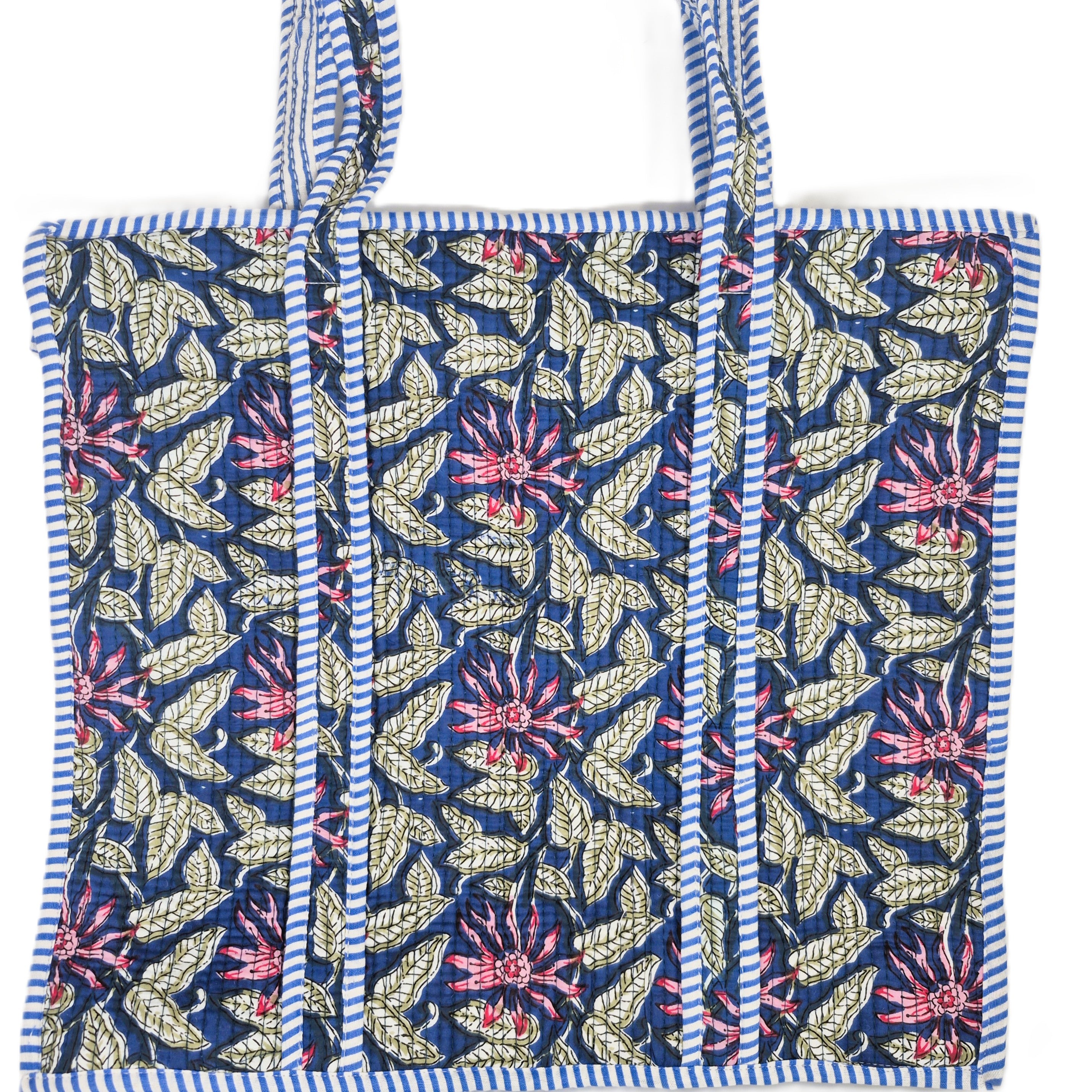 Tote bag with blue and white striped border and navy and pink floral pattern