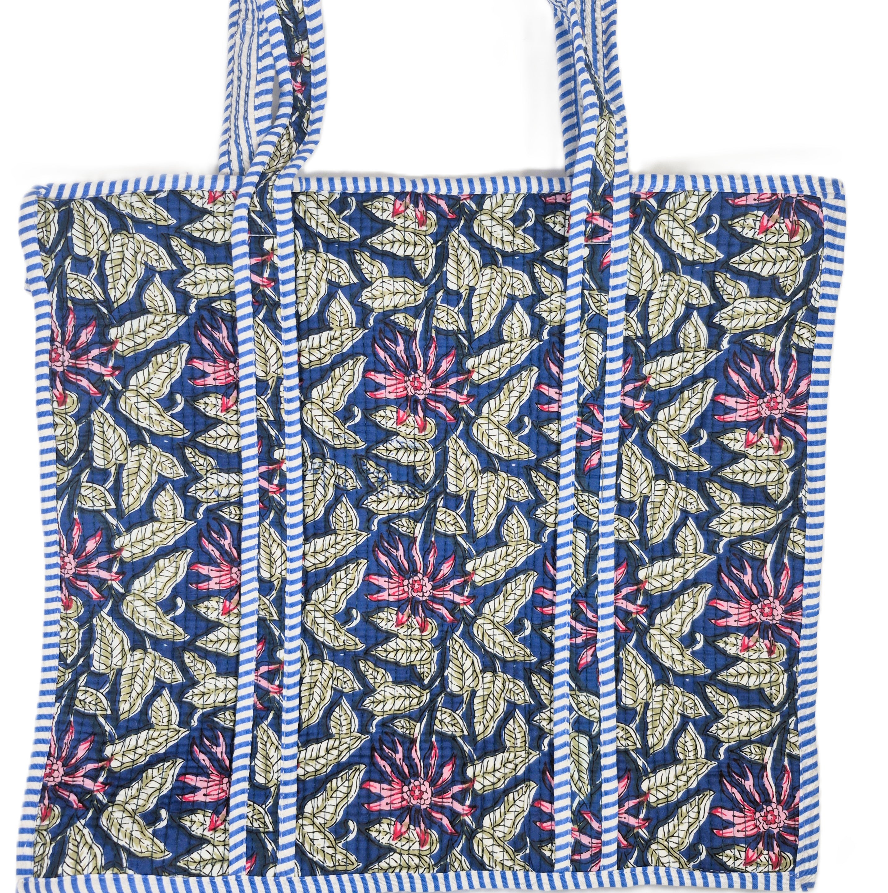 Tote bag with blue and white striped border and navy and pink floral pattern