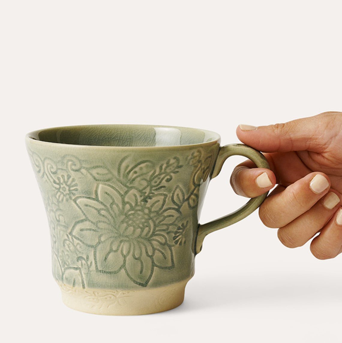Ceramic Tea Mug: ceramic mug for tea or coffee, from Inside Living Singapore. Styled in a home setting.