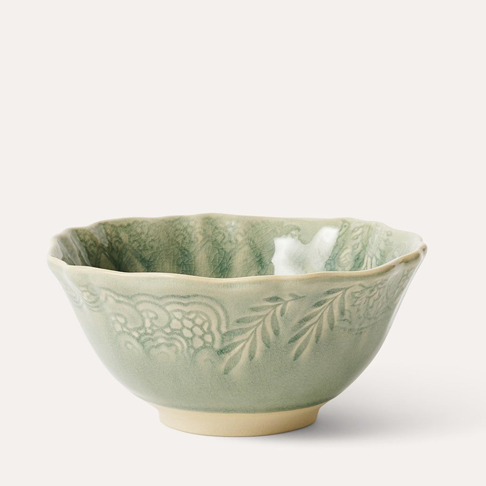 Ceramic soup or rice bowl with a scalloped edge, glazed in antique, crafted in Portugal for soup or rice.