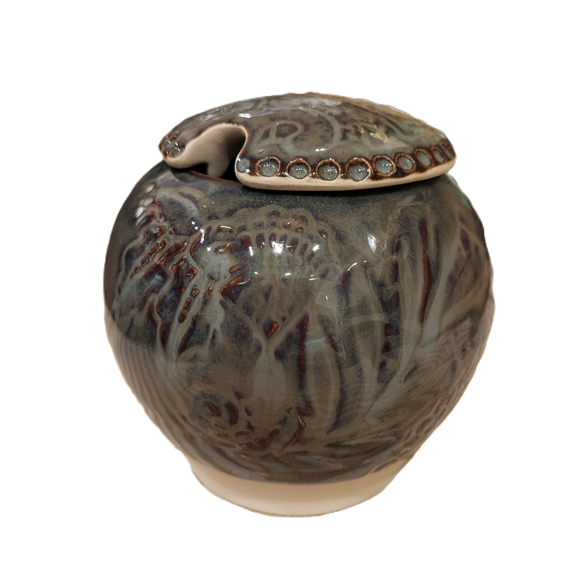 Ceramic Sugar Bowl shown from another angle, plates at Inside Living Singapore.