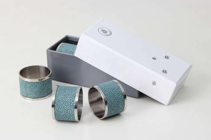 Set of 4 napkin rings in teal faux shagreen with stainless steel, 5 cm across for a dressed dining table