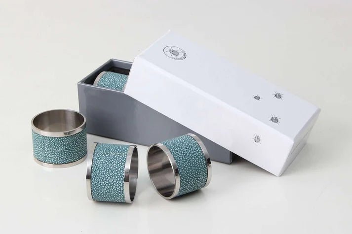 Set of 4 napkin rings in teal faux shagreen with stainless steel, 5 cm across for a dressed dining table