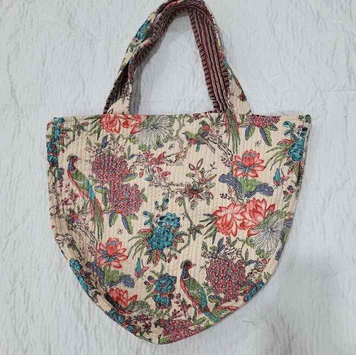 Alternative view of the block print tote bag, which has a contrasting block printed lining and a zippered pocket.